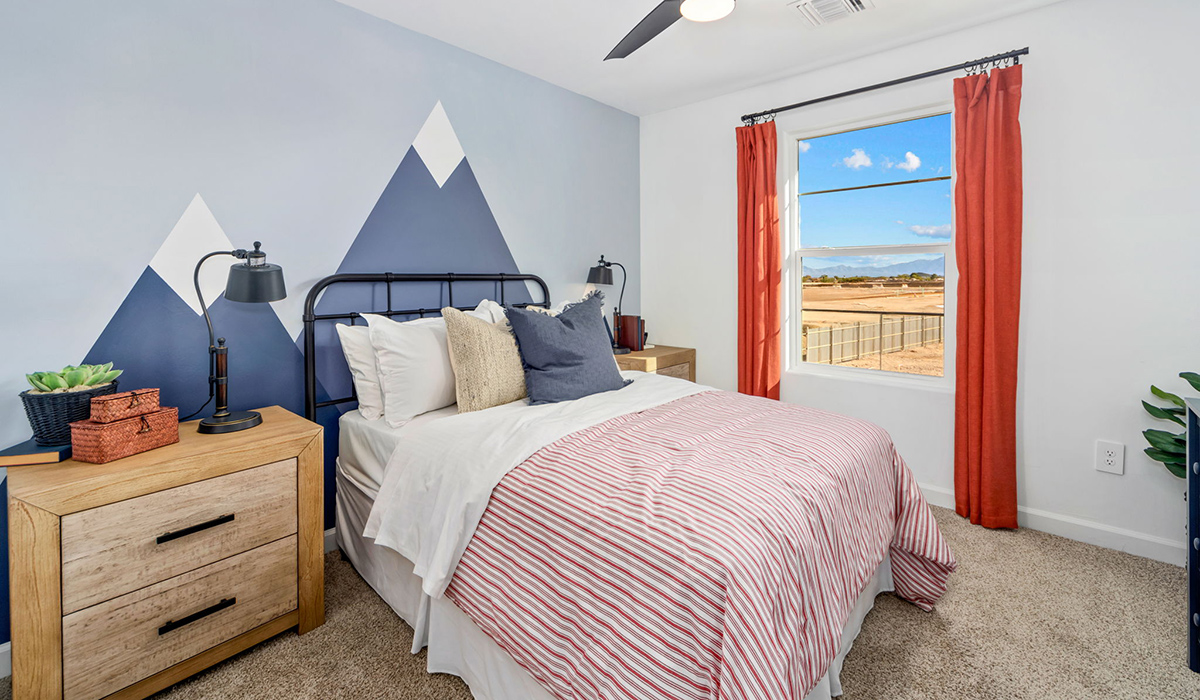 Discover the Gila, a brand new versatile two-story floor plan offering 2,057 sq. ft. of comfortable, modern living space available now within Coronet at Gladden Farms Community in Marana, Arizona.  Thoughtfully crafted for households of all sizes, the Gila features four bedrooms, a spacious loft, and three full bathrooms, ensuring every family member has their own space to unwind and recharge.  A standout highlight of this home is the guest-style suite on the main floor, offering convenient access to a full bathroom. Perfect for visitors, multi-generational living, or private home office, this main-level bedroom offers exceptional flexibility.  The main floor creates an inviting flow, with a generous great room that connects seamlessly to the dining area and kitchen. The kitchen features a large center island, Shaker-style cabinetry, and ample storage space to include a large pantry.  Upstairs, the Gila continues to impress with thoughtful design and family-friendly layout. The well-appointed primary bedroom includes a private en-suite bathroom and large walk-in closet. Bedrooms 2 and 3, along with the loft, share a full bathroom conveniently located for easy access. An additional standout feature is Bedroom 2, which includes a large walk-in closet—a perfect setup for teens, young adults, or anyone who appreciates extra storage and personal space. The second floor also features a large laundry room, conveniently located near the bedrooms.  The Gila is designed with energy efficiency in mind. This DOE Zero Energy Ready Home offers a sustainable lifestyle with advanced features like tankless water heaters, energy-efficient LED lighting, and high-performance insulation, ensuring lower utility costs and a reduced environmental footprint.  Living at Coronet at Gladden Farms means enjoying a community that values both comfort and outdoor adventure. With access to 830 acres of green space, parks, playgrounds, and exclusive amenities like a sparkling pool, fitness center, and clubhouse, this community is perfect for families and active lifestyles.  *Images shown are for reference only. They depict the Gila model home and may not represent the actual home.