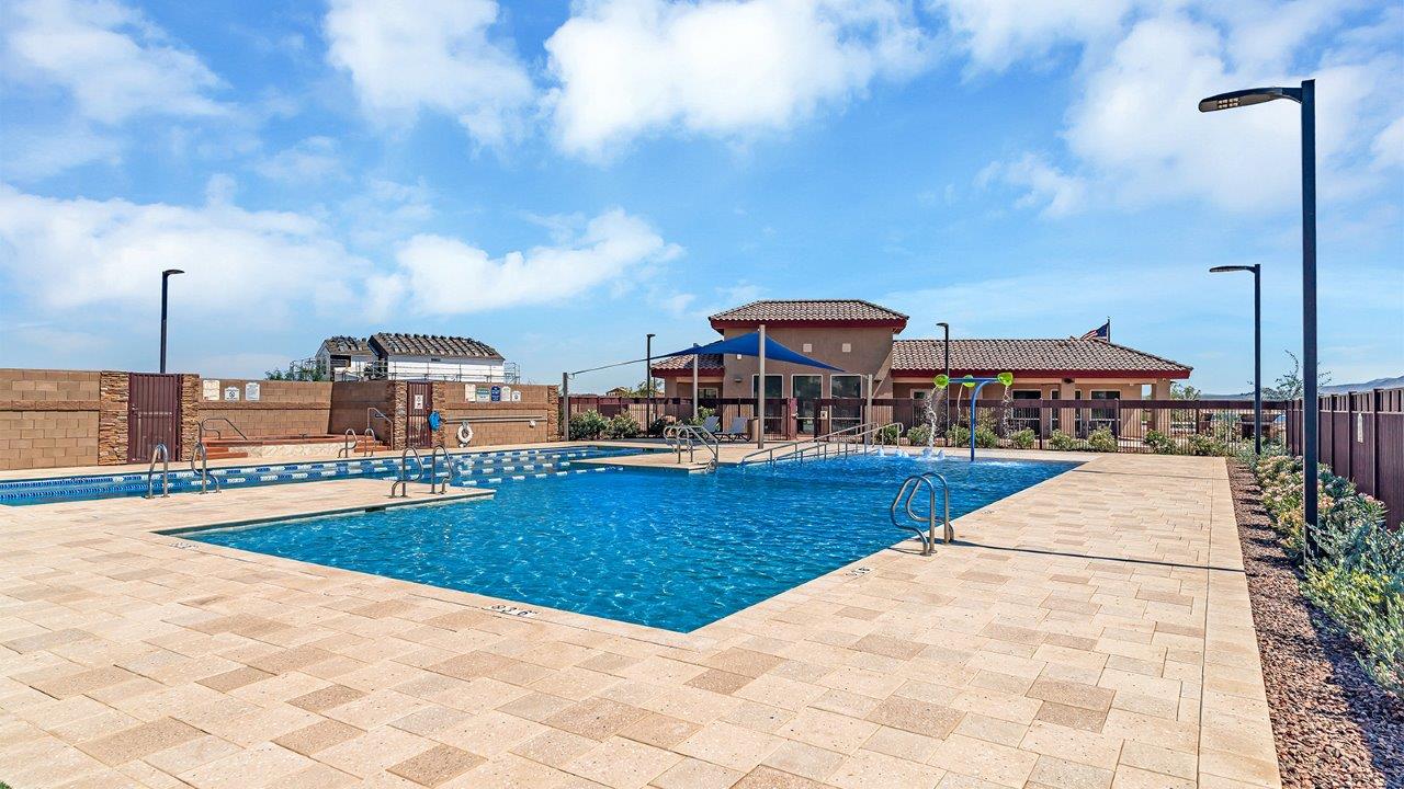 Discover the Gila — a brand new versatile two-story floor plan offering 2,057 sq. ft. of comfortable, modern living space available now within Coronet at Gladden Farms Community in Marana, Arizona.  Thoughtfully crafted for households of all sizes, the Gila features four bedrooms, a spacious loft, and three full bathrooms, ensuring every family member has their own space to unwind and recharge.  A standout highlight of this home is the guest-style suite on the main floor, offering convenient access to a full bathroom. Perfect for visitors, multi-generational living, or private home office, this main-level bedroom offers exceptional flexibility.  The main floor creates an inviting flow, with a generous great room that connects seamlessly to the dining area and kitchen. The kitchen features a large center island, Shaker-style cabinetry, and ample storage space to include a large pantry.  Upstairs, the Gila continues to impress with thoughtful design and family-friendly layout. The well-appointed primary bedroom includes a private en-suite bathroom and large walk-in closet. Bedrooms 2 and 3, along with the loft, share a full bathroom conveniently located for easy access. An additional standout feature is Bedroom 2, which includes a large walk-in closet—a perfect setup for teens, young adults, or anyone who appreciates extra storage and personal space. The second floor also features a large laundry room, conveniently located near the bedrooms.  The Gila is designed with energy efficiency in mind. This DOE Zero Energy Ready Home offers a sustainable lifestyle with advanced features like tankless water heaters, energy-efficient LED lighting, and high-performance insulation, ensuring lower utility costs and a reduced environmental footprint.  Living at Coronet at Gladden Farms means enjoying a community that values both comfort and outdoor adventure. With access to 830 acres of green space, parks, playgrounds, and exclusive amenities like a sparkling pool, fitness center, and clubhouse, this community is perfect for families and active lifestyles.