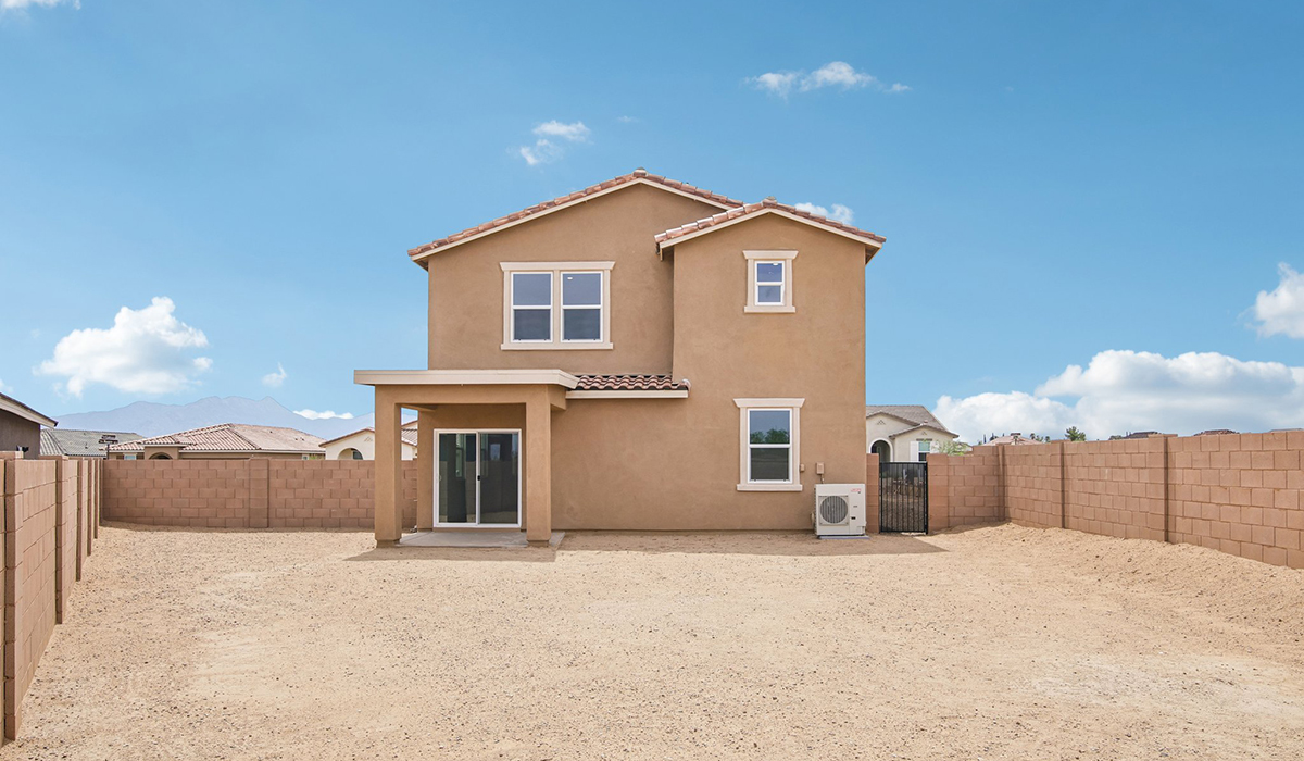 Introducing The Kleindale, a brand new stunning two-story home within the master-planned Coronet at Gladden Farms Community in Marana, Arizona.  This spacious and beautifully designed two-story home offers 2,406 sq. ft., five bedrooms, three full bathrooms, and versatile 2-3 tandem car garage. This impressive layout is ideal for large households, multigenerational living, or anyone who simply wants room to grow, gather, and live comfortably.  A welcoming front porch leads you into the entryway, which flows into the expansive open-concept great room, dining area, and kitchen. The kitchen features stainless steel gas range, microwave, and dishwasher, and plenty of storage space. With thoughtful design and abundant natural light, the main floor truly feels like the heart of the home.  One of the standout features of The Kleindale is the fifth bedroom located on the main floor with convenient access to a full bathroom, making it perfect for a guest suite or private home office.  A spacious and private second floor continues the living space with a generous loft leading to the primary bedroom, complete with an en-suite bathroom and large walk-in closet. Three additional bedrooms are also located on the second floor each offering plenty of space for family, guests, or work-from-home needs. The upstairs also includes a full bathroom and laundry room.  Our homes at Coronet are designed with the future in mind. Each home features a light lace stucco exterior, landscaped front yards with auto drip irrigation, and large backyards that are fully fenced and ready for your personal touch. Inside, the Home is Connected® Smart Home package brings modern convenience to your fingertips with a smart thermostat, video doorbell, keyless entry, and a Wi-Fi® enabled garage door opener.  With its expansive living spaces, flexible bedroom arrangements, and thoughtful deign throughout, The Kleindale offers the ultimate combination of comfort, convenience, and room to thrive.  Living at Coronet at Gladden Farms means enjoying a community that values both comfort and outdoor adventure. With access to 830 acres of green space, parks, playgrounds, and exclusive amenities like a sparkling pool, fitness center, and clubhouse, this community is perfect for families and active lifestyles.  *Images shown are for reference only. They depict The Kleindale spec home and may not represent the actual home.