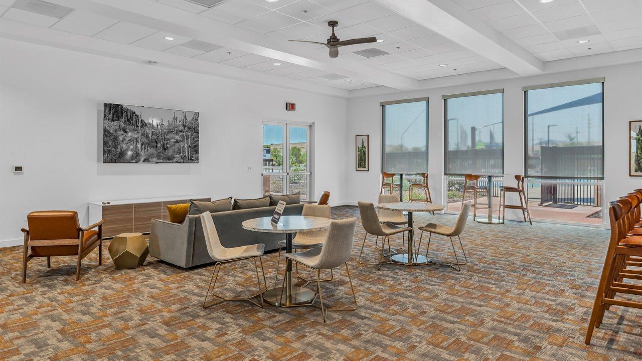 Welcome to The Caroline, the newest floor plan within Coronet at Gladden Farms Community in Marana, Arizona. This single-story new home is 1,536 square feet and is thoughtfully planned out throughout the living spaces. The Caroline offers three bedrooms and two bathrooms, making it ideal for families who value both space and convenience.  As you enter through the inviting covered porch, you’re greeted by a bright and airy entryway that flows into the heart of the home. The expansive great room, dining area, and kitchen are thoughtfully connected, creating an ideal space for entertaining or enjoying time with family. The kitchen features a large island, quartz countertops, Shaker-style cabinetry, spacious pantry, and modern stainless-steel appliances ensure your kitchen is both functional and stylish.  The Caroline’s layout includes a generously sized primary bedroom, carefully positioned for privacy at the rear of the home. This room features a large walk-in closet and an en-suite bathroom. The additional two bedrooms are well-sized and located in separate areas of the home with easy access to the main full bathroom.  The covered patio, accessible from the great room, offers a perfect spot for outdoor living, where you can enjoy Arizona’s beautiful weather throughout the year. Whether you’re hosting a barbecue or simply relaxing, this outdoor space enhances the home’s appeal.  The Caroline is designed with energy efficiency in mind. This DOE Zero Energy Ready Home offers a sustainable lifestyle with advanced features like tankless water heaters, energy-efficient LED lighting, and high-performance insulation, ensuring lower utility costs and a reduced environmental footprint.  Living at Coronet at Gladden Farms means enjoying a community that values both comfort and outdoor adventure. With access to 830 acres of green space, parks, playgrounds, and exclusive amenities like a sparkling pool, fitness center, and clubhouse, this community is perfect for families and active lifestyles.