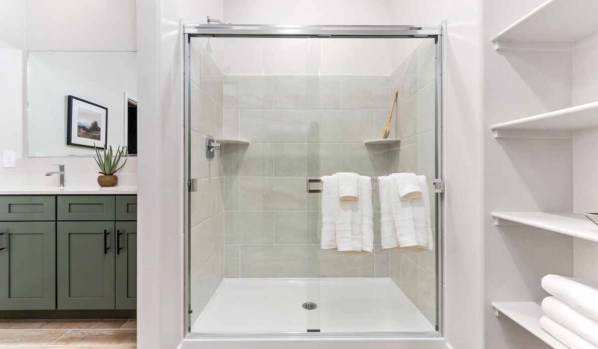 Welcome to The Caroline, the newest floor plan within Coronet at Gladden Farms Community in Marana, Arizona. This single-story new home is 1,536 square feet and is thoughtfully planned out throughout the living spaces. The Caroline offers three bedrooms and two bathrooms, making it ideal for families who value both space and convenience.  As you enter through the inviting covered porch, you’re greeted by a bright and airy entryway that flows into the heart of the home. The expansive great room, dining area, and kitchen are thoughtfully connected, creating an ideal space for entertaining or enjoying time with family. The kitchen features a large island, quartz countertops, Shaker-style cabinetry, spacious pantry, and modern stainless-steel appliances ensure your kitchen is both functional and stylish.  The Caroline’s layout includes a generously sized primary bedroom, carefully positioned for privacy at the rear of the home. This room features a large walk-in closet and an en-suite bathroom. The additional two bedrooms are well-sized and located in separate areas of the home with easy access to the main full bathroom.  The covered patio, accessible from the great room, offers a perfect spot for outdoor living, where you can enjoy Arizona’s beautiful weather throughout the year. Whether you’re hosting a barbecue or simply relaxing, this outdoor space enhances the home’s appeal.  The Caroline is designed with energy efficiency in mind. This DOE Zero Energy Ready Home offers a sustainable lifestyle with advanced features like tankless water heaters, energy-efficient LED lighting, and high-performance insulation, ensuring lower utility costs and a reduced environmental footprint.  Living at Coronet at Gladden Farms means enjoying a community that values both comfort and outdoor adventure. With access to 830 acres of green space, parks, playgrounds, and exclusive amenities like a sparkling pool, fitness center, and clubhouse, this community is perfect for families and active lifestyles.  *Images shown are for reference only. They depict the Caroline sales model home and may not represent the actual home.