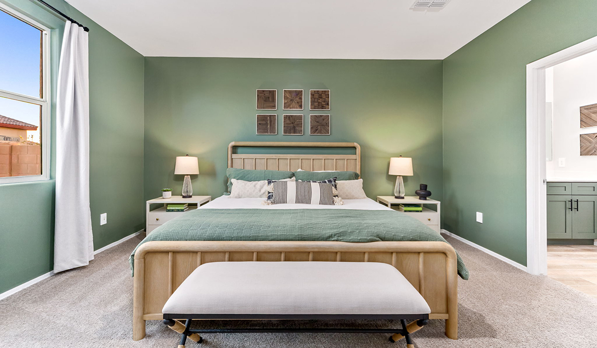 Welcome to The Caroline, the newest floor plan within Coronet at Gladden Farms Community in Marana, Arizona. This single-story new home is 1,536 square feet and is thoughtfully planned out throughout the living spaces. The Caroline offers three bedrooms and two bathrooms, making it ideal for families who value both space and convenience.  As you enter through the inviting covered porch, you’re greeted by a bright and airy entryway that flows into the heart of the home. The expansive great room, dining area, and kitchen are thoughtfully connected, creating an ideal space for entertaining or enjoying time with family. The kitchen features a large island, quartz countertops, Shaker-style cabinetry, spacious pantry, and modern stainless-steel appliances ensure your kitchen is both functional and stylish.  The Caroline’s layout includes a generously sized primary bedroom, carefully positioned for privacy at the rear of the home. This room features a large walk-in closet and an en-suite bathroom. The additional two bedrooms are well-sized and located in separate areas of the home with easy access to the main full bathroom.  The covered patio, accessible from the great room, offers a perfect spot for outdoor living, where you can enjoy Arizona’s beautiful weather throughout the year. Whether you’re hosting a barbecue or simply relaxing, this outdoor space enhances the home’s appeal.  The Caroline is designed with energy efficiency in mind. This DOE Zero Energy Ready Home offers a sustainable lifestyle with advanced features like tankless water heaters, energy-efficient LED lighting, and high-performance insulation, ensuring lower utility costs and a reduced environmental footprint.  Living at Coronet at Gladden Farms means enjoying a community that values both comfort and outdoor adventure. With access to 830 acres of green space, parks, playgrounds, and exclusive amenities like a sparkling pool, fitness center, and clubhouse, this community is perfect for families and active lifestyles.