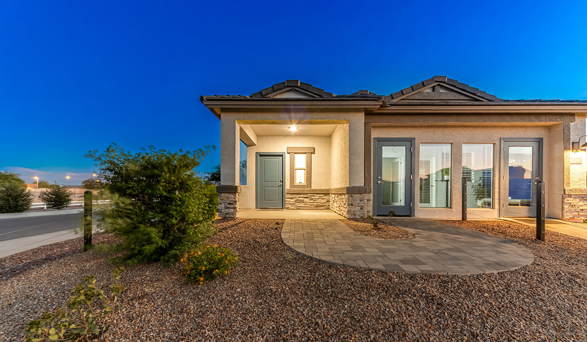 Welcome to The Caroline, the newest floor plan within Coronet at Gladden Farms Community in Marana, Arizona. This single-story new home is 1,536 square feet and is thoughtfully planned out throughout the living spaces. The Caroline offers three bedrooms and two bathrooms, making it ideal for families who value both space and convenience.  As you enter through the inviting covered porch, you’re greeted by a bright and airy entryway that flows into the heart of the home. The expansive great room, dining area, and kitchen are thoughtfully connected, creating an ideal space for entertaining or enjoying time with family. The kitchen features a large island, quartz countertops, Shaker-style cabinetry, spacious pantry, and modern stainless-steel appliances ensure your kitchen is both functional and stylish.  The Caroline’s layout includes a generously sized primary bedroom, carefully positioned for privacy at the rear of the home. This room features a large walk-in closet and an en-suite bathroom. The additional two bedrooms are well-sized and located in separate areas of the home with easy access to the main full bathroom.  The covered patio, accessible from the great room, offers a perfect spot for outdoor living, where you can enjoy Arizona’s beautiful weather throughout the year. Whether you’re hosting a barbecue or simply relaxing, this outdoor space enhances the home’s appeal.  The Caroline is designed with energy efficiency in mind. This DOE Zero Energy Ready Home offers a sustainable lifestyle with advanced features like tankless water heaters, energy-efficient LED lighting, and high-performance insulation, ensuring lower utility costs and a reduced environmental footprint.  Living at Coronet at Gladden Farms means enjoying a community that values both comfort and outdoor adventure. With access to 830 acres of green space, parks, playgrounds, and exclusive amenities like a sparkling pool, fitness center, and clubhouse, this community is perfect for families and active lifestyles.