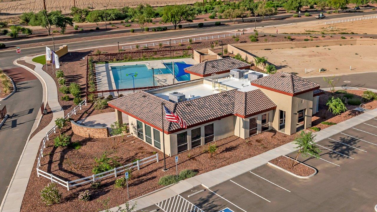 Welcome to The Caroline, the newest floor plan within Coronet at Gladden Farms Community in Marana, Arizona. This single-story new home is 1,536 square feet and is thoughtfully planned out throughout the living spaces. The Caroline offers three bedrooms and two bathrooms, making it ideal for families who value both space and convenience.  As you enter through the inviting covered porch, you’re greeted by a bright and airy entryway that flows into the heart of the home. The expansive great room, dining area, and kitchen are thoughtfully connected, creating an ideal space for entertaining or enjoying time with family. The kitchen features a large island, quartz countertops, Shaker-style cabinetry, spacious pantry, and modern stainless-steel appliances ensure your kitchen is both functional and stylish.  The Caroline’s layout includes a generously sized primary bedroom, carefully positioned for privacy at the rear of the home. This room features a large walk-in closet and an en-suite bathroom. The additional two bedrooms are well-sized and located in separate areas of the home with easy access to the main full bathroom.  The covered patio, accessible from the great room, offers a perfect spot for outdoor living, where you can enjoy Arizona’s beautiful weather throughout the year. Whether you’re hosting a barbecue or simply relaxing, this outdoor space enhances the home’s appeal.  The Caroline is designed with energy efficiency in mind. This DOE Zero Energy Ready Home offers a sustainable lifestyle with advanced features like tankless water heaters, energy-efficient LED lighting, and high-performance insulation, ensuring lower utility costs and a reduced environmental footprint.  Living at Coronet at Gladden Farms means enjoying a community that values both comfort and outdoor adventure. With access to 830 acres of green space, parks, playgrounds, and exclusive amenities like a sparkling pool, fitness center, and clubhouse, this community is perfect for families and active lifestyles.