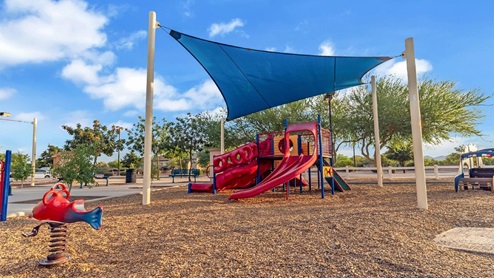 Discover new homes within the only gated community in Gladden Farms. Coronet at Gladden Farms, a premier D.R. Horton community where modern living meets the scenic charm of Marana, Arizona. Coronet offers residents the perfect blend of small-town warmth and modern amenities. Surrounded by 830 acres of green space, 28 parks, and 19 playgrounds, this gated community is designed for families who value both comfort and outdoor adventure. Residents of Coronet at Gladden Farms enjoy exclusive amenities such as a sparkling community pool, jacuzzi, fitness center, and a clubhouse complete with a BBQ area and patio. The community also offers walking trails, a dog park, and playgrounds, making it the ideal environment for families and active lifestyles. Each home is thoughtfully designed with high-end finishes, including quartz countertops, wood-look luxury vinyl plank flooring, tile roofs, Spanish Lace stucco exteriors and beautifully landscaped front yards with auto drip irrigation. Additionally, all homes feature covered front porches and back patios, perfect for enjoying the stunning Arizona sunsets and monsoons. Coronet at Gladden Farms is built with a commitment to energy efficiency and sustainability. Each home meets the DOE Zero Energy Ready Home standards, meaning they are constructed to be so energy-efficient that a renewable energy system could offset most or all of the home's annual energy use. These homes include advanced features such as tankless water heaters, energy-efficient LED lighting, and high-performance insulation, ensuring lower utility costs and a reduced environmental footprint. The Home is Connected Smart Home package, which includes a smart thermostat, video doorbell, keyless entry, a Wi-Fi-enabled garage door opener, and much more, provides modern convenience and enhanced security. Living in Coronet at Gladden Farms means being part of a thriving community with easy access to shopping, dining, and recreation. The greater Gladden Farms area is equipped with amenities like a splashpad, soccer fields, and the Paws & Claws Dog Park. Families will appreciate being part of the Marana Unified School District, with Gladden Farms Elementary nearby and a new K-8 school opening in 2025. Beyond the community, residents can explore the natural beauty of the area with proximity to Picacho Peak State Park, Tortolita Mountain Park, and Saguaro National Park, offering endless opportunities for hiking, cycling, and wildlife viewing. Experience the perfect blend of comfort, convenience, and community at Coronet at Gladden Farms—where new homes, energy efficiency, and a vibrant lifestyle await.