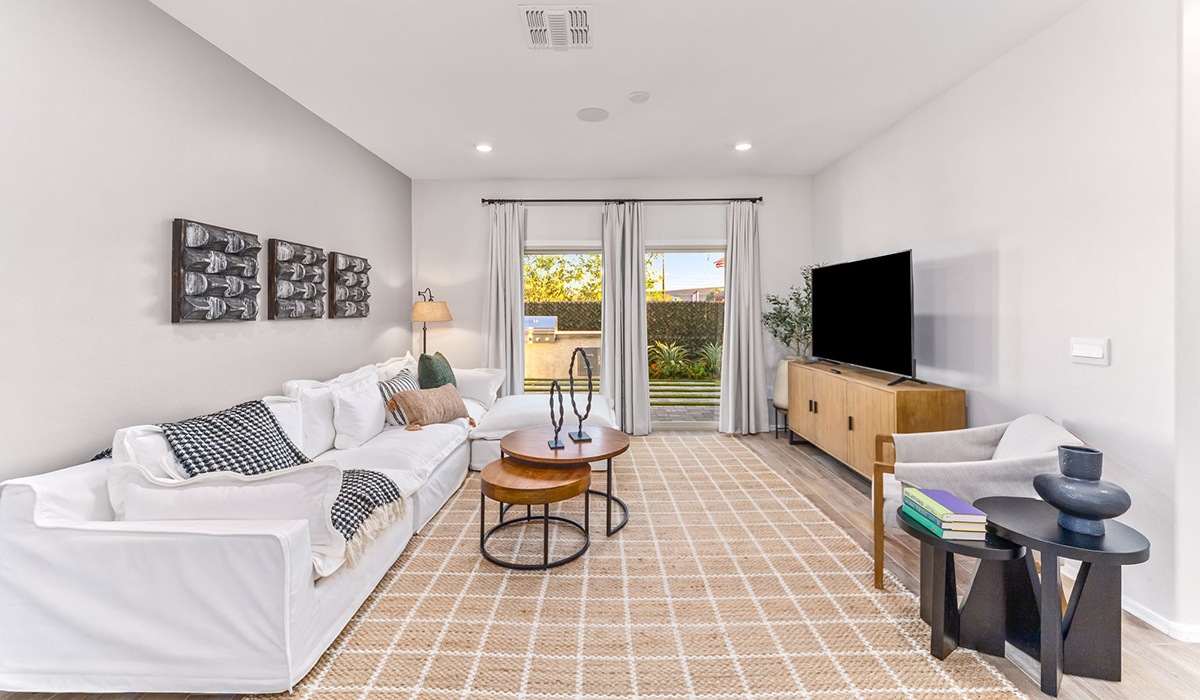 Welcome to The Caroline, the newest floor plan within Coronet at Gladden Farms Community in Marana, Arizona. This single-story new home is 1,536 square feet and is thoughtfully planned out throughout the living spaces. The Caroline offers three bedrooms and two bathrooms, making it ideal for families who value both space and convenience.  As you enter through the inviting covered porch, you’re greeted by a bright and airy entryway that flows into the heart of the home. The expansive great room, dining area, and kitchen are thoughtfully connected, creating an ideal space for entertaining or enjoying time with family.  The Caroline’s layout includes a generously sized primary bedroom, carefully positioned for privacy at the rear of the home. This spacious room features a large walk-in closet and an en-suite bathroom. The additional two bedrooms are well-sized and located in separate areas of the home with easy access to the main full bathroom.  The Caroline is designed with energy efficiency in mind and features a tankless water heater, energy-efficient LED lighting, and high-performance insulation, helping to lower utility costs.  Living at Coronet at Gladden Farms means enjoying a community that values both comfort and outdoor adventure. With access to 830 acres of green space, parks, playgrounds, and exclusive amenities like a sparkling pool, fitness center, and clubhouse, this community is perfect for families and active lifestyles.  *Images shown are for reference only. They depict The Caroline model home and may not represent the actual home.