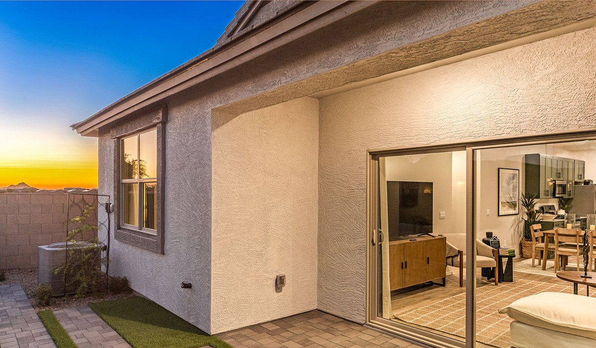 Welcome to The Caroline, the newest floor plan within Coronet at Gladden Farms Community in Marana, Arizona. This single-story new home is 1,536 square feet and is thoughtfully planned out throughout the living spaces. The Caroline offers three bedrooms and two bathrooms, making it ideal for families who value both space and convenience.  As you enter through the inviting covered porch, you’re greeted by a bright and airy entryway that flows into the heart of the home. The expansive great room, dining area, and kitchen are thoughtfully connected, creating an ideal space for entertaining or enjoying time with family. The kitchen features a large island, quartz countertops, Shaker-style cabinetry, spacious pantry, and modern stainless-steel appliances ensure your kitchen is both functional and stylish.  The Caroline’s layout includes a generously sized primary bedroom, carefully positioned for privacy at the rear of the home. This room features a large walk-in closet and an en-suite bathroom. The additional two bedrooms are well-sized and located in separate areas of the home with easy access to the main full bathroom.  The covered patio, accessible from the great room, offers a perfect spot for outdoor living, where you can enjoy Arizona’s beautiful weather throughout the year. Whether you’re hosting a barbecue or simply relaxing, this outdoor space enhances the home’s appeal.  The Caroline is designed with energy efficiency in mind. This DOE Zero Energy Ready Home offers a sustainable lifestyle with advanced features like tankless water heaters, energy-efficient LED lighting, and high-performance insulation, ensuring lower utility costs and a reduced environmental footprint.  Living at Coronet at Gladden Farms means enjoying a community that values both comfort and outdoor adventure. With access to 830 acres of green space, parks, playgrounds, and exclusive amenities like a sparkling pool, fitness center, and clubhouse, this community is perfect for families and active lifestyles.