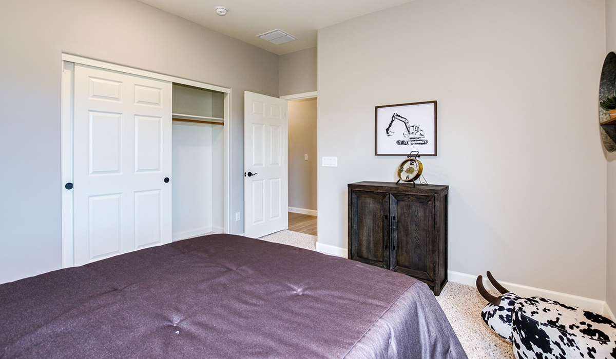 Welcome to The Citrine, a spacious single-story new home located in the Sycamore Vista. With 2,577 square feet of well-planned living space, this home offers four bedrooms, three bathrooms, and a dedicated study, making it ideal for families who value both space and convenience.  As you enter through the inviting covered porch, you’re greeted by a bright and airy entryway that flows into the heart of the home. The expansive great room, dining area, and kitchen are thoughtfully connected, creating an ideal space for entertaining or enjoying time with family. The kitchen features a large island, quartz countertops, and Shaker-style cabinetry. A spacious pantry and modern stainless-steel appliances ensure your kitchen is both functional and stylish.  The Citrine’s layout includes a generously sized primary bedroom, carefully positioned for privacy at the rear of the home. This room features a large walk-in closet and an en-suite bathroom with luxurious super shower. The additional three bedrooms are well-sized and located in separate areas of the home, ensuring privacy and easy access to two more full bathrooms.  One of the highlights of The Citrine is its versatile study, which can be used as a home office, media room, or extra bedroom for guests. The large laundry room, conveniently situated near the bedrooms, adds to the home’s practicality.  The covered patio, accessible from the great room, offers a perfect spot for outdoor living, where you can enjoy Arizona’s beautiful weather throughout the year. Whether you’re hosting a barbecue or simply relaxing, this outdoor space enhances the home’s appeal.  Designed with energy efficiency and modern living in mind, The Citrine includes smart home technology ensuring comfort and sustainability. Large windows throughout the home allow natural light to brighten every corner.  The Citrine combines style, comfort, and practicality, making it a perfect place to call home in one of Vails’s most sought-after communities.  *Images shown are for reference only. They depict The Citrine sales model home and may not represent the actual home.