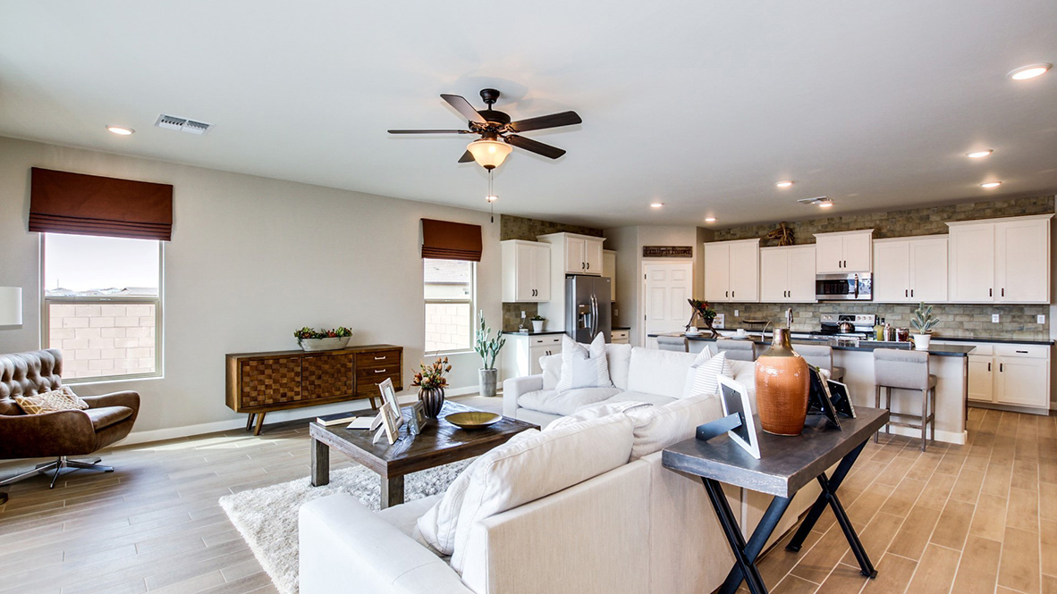 Welcome to The Citrine, a spacious single-story new home located in the Sycamore Vista. With 2,577 square feet of well-planned living space, this home offers four bedrooms, three bathrooms, and a dedicated study, making it ideal for families who value both space and convenience.  As you enter through the inviting covered porch, you’re greeted by a bright and airy entryway that flows into the heart of the home. The expansive great room, dining area, and kitchen are thoughtfully connected, creating an ideal space for entertaining or enjoying time with family. The kitchen features a large island, quartz countertops, and Shaker-style cabinetry. A spacious pantry and modern stainless-steel appliances ensure your kitchen is both functional and stylish.  The Citrine’s layout includes a generously sized primary bedroom, carefully positioned for privacy at the rear of the home. This room features a large walk-in closet and an en-suite bathroom with luxurious super shower. The additional three bedrooms are well-sized and located in separate areas of the home, ensuring privacy and easy access to two more full bathrooms.  One of the highlights of The Citrine is its versatile study, which can be used as a home office, media room, or extra bedroom for guests. The large laundry room, conveniently situated near the bedrooms, adds to the home’s practicality.  The covered patio, accessible from the great room, offers a perfect spot for outdoor living, where you can enjoy Arizona’s beautiful weather throughout the year. Whether you’re hosting a barbecue or simply relaxing, this outdoor space enhances the home’s appeal.  Designed with energy efficiency and modern living in mind, The Citrine includes smart home technology ensuring comfort and sustainability. Large windows throughout the home allow natural light to brighten every corner.  The Citrine combines style, comfort, and practicality, making it a perfect place to call home in one of Vails’s most sought-after communities.