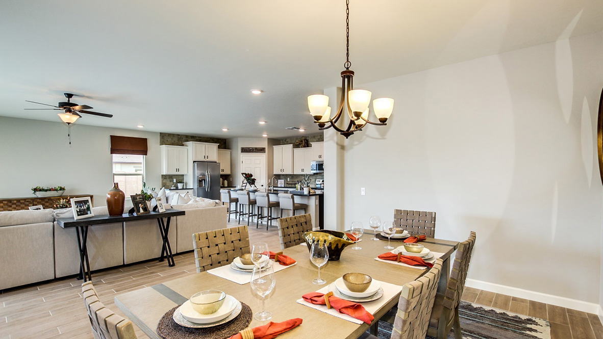 Welcome to The Citrine, a spacious single-story new home located in the Sycamore Vista. With 2,577 square feet of well-planned living space, this home offers four bedrooms, three bathrooms, and a dedicated study, making it ideal for families who value both space and convenience.  As you enter through the inviting covered porch, you’re greeted by a bright and airy entryway that flows into the heart of the home. The expansive great room, dining area, and kitchen are thoughtfully connected, creating an ideal space for entertaining or enjoying time with family. The kitchen features a large island, quartz countertops, and Shaker-style cabinetry. A spacious pantry and modern stainless-steel appliances ensure your kitchen is both functional and stylish.  The Citrine’s layout includes a generously sized primary bedroom, carefully positioned for privacy at the rear of the home. This room features a large walk-in closet and an en-suite bathroom with luxurious super shower. The additional three bedrooms are well-sized and located in separate areas of the home, ensuring privacy and easy access to two more full bathrooms.  One of the highlights of The Citrine is its versatile study, which can be used as a home office, media room, or extra bedroom for guests. The large laundry room, conveniently situated near the bedrooms, adds to the home’s practicality.  The covered patio, accessible from the great room, offers a perfect spot for outdoor living, where you can enjoy Arizona’s beautiful weather throughout the year. Whether you’re hosting a barbecue or simply relaxing, this outdoor space enhances the home’s appeal.  Designed with energy efficiency and modern living in mind, The Citrine includes smart home technology ensuring comfort and sustainability. Large windows throughout the home allow natural light to brighten every corner.  The Citrine combines style, comfort, and practicality, making it a perfect place to call home in one of Vails’s most sought-after communities.