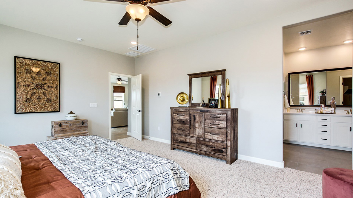 Welcome to The Citrine, a spacious single-story new home located in the Sycamore Vista. With 2,577 square feet of well-planned living space, this home offers four bedrooms, three bathrooms, and a dedicated study, making it ideal for families who value both space and convenience.  As you enter through the inviting covered porch, you’re greeted by a bright and airy entryway that flows into the heart of the home. The expansive great room, dining area, and kitchen are thoughtfully connected, creating an ideal space for entertaining or enjoying time with family. The kitchen features a large island, quartz countertops, and Shaker-style cabinetry. A spacious pantry and modern stainless-steel appliances ensure your kitchen is both functional and stylish.  The Citrine’s layout includes a generously sized primary bedroom, carefully positioned for privacy at the rear of the home. This room features a large walk-in closet and an en-suite bathroom with luxurious super shower. The additional three bedrooms are well-sized and located in separate areas of the home, ensuring privacy and easy access to two more full bathrooms.  One of the highlights of The Citrine is its versatile study, which can be used as a home office, media room, or extra bedroom for guests. The large laundry room, conveniently situated near the bedrooms, adds to the home’s practicality.  The covered patio, accessible from the great room, offers a perfect spot for outdoor living, where you can enjoy Arizona’s beautiful weather throughout the year. Whether you’re hosting a barbecue or simply relaxing, this outdoor space enhances the home’s appeal.  Designed with energy efficiency and modern living in mind, The Citrine includes smart home technology ensuring comfort and sustainability. Large windows throughout the home allow natural light to brighten every corner.  The Citrine combines style, comfort, and practicality, making it a perfect place to call home in one of Vails’s most sought-after communities.