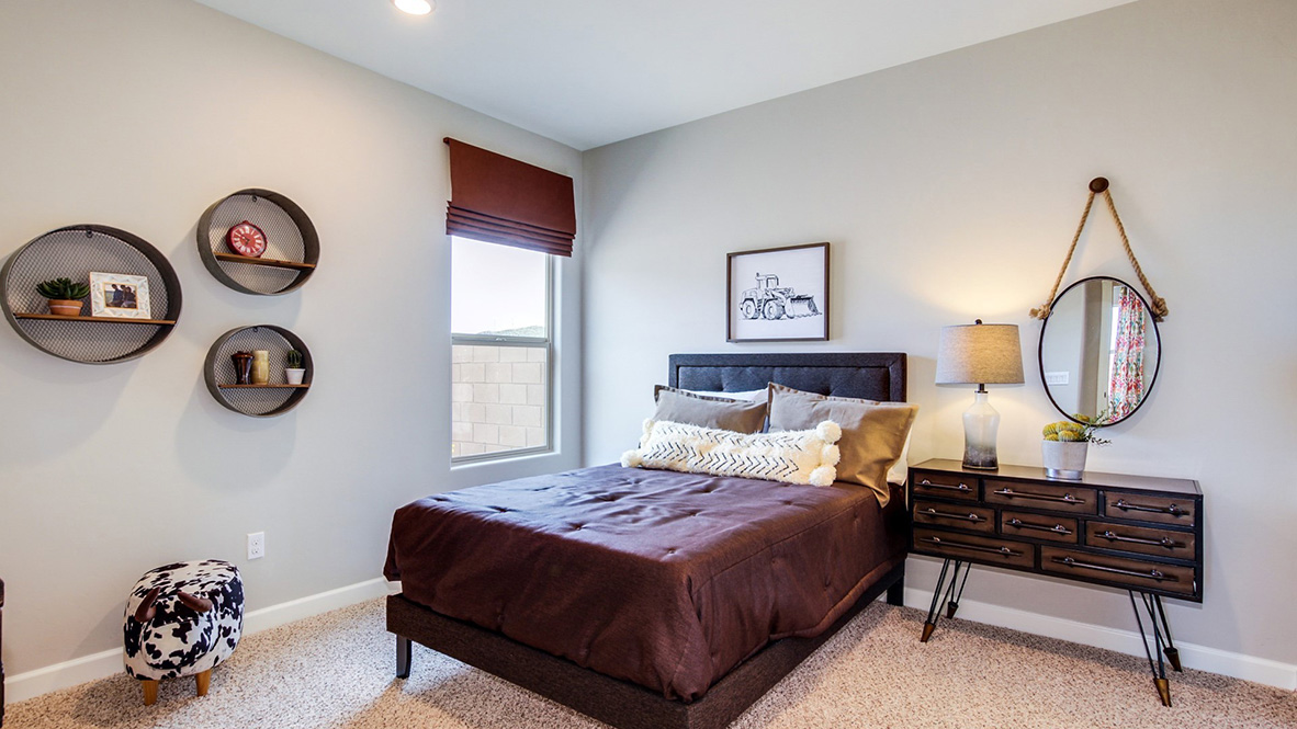 Welcome to The Citrine, a spacious single-story new home located in the Sycamore Vista. With 2,577 square feet of well-planned living space, this home offers four bedrooms, three bathrooms, and a dedicated study, making it ideal for families who value both space and convenience.  As you enter through the inviting covered porch, you’re greeted by a bright and airy entryway that flows into the heart of the home. The expansive great room, dining area, and kitchen are thoughtfully connected, creating an ideal space for entertaining or enjoying time with family. The kitchen features a large island, quartz countertops, and Shaker-style cabinetry. A spacious pantry and modern stainless-steel appliances ensure your kitchen is both functional and stylish.  The Citrine’s layout includes a generously sized primary bedroom, carefully positioned for privacy at the rear of the home. This room features a large walk-in closet and an en-suite bathroom with luxurious super shower. The additional three bedrooms are well-sized and located in separate areas of the home, ensuring privacy and easy access to two more full bathrooms.  One of the highlights of The Citrine is its versatile study, which can be used as a home office, media room, or extra bedroom for guests. The large laundry room, conveniently situated near the bedrooms, adds to the home’s practicality.  The covered patio, accessible from the great room, offers a perfect spot for outdoor living, where you can enjoy Arizona’s beautiful weather throughout the year. Whether you’re hosting a barbecue or simply relaxing, this outdoor space enhances the home’s appeal.  Designed with energy efficiency and modern living in mind, The Citrine includes smart home technology ensuring comfort and sustainability. Large windows throughout the home allow natural light to brighten every corner.  The Citrine combines style, comfort, and practicality, making it a perfect place to call home in one of Vails’s most sought-after communities.