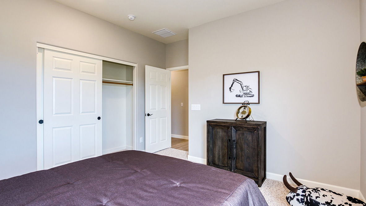 Welcome to The Citrine, a spacious single-story new home located in the Sycamore Vista. With 2,577 square feet of well-planned living space, this home offers four bedrooms, three bathrooms, and a dedicated study, making it ideal for families who value both space and convenience.  As you enter through the inviting covered porch, you’re greeted by a bright and airy entryway that flows into the heart of the home. The expansive great room, dining area, and kitchen are thoughtfully connected, creating an ideal space for entertaining or enjoying time with family. The kitchen features a large island, quartz countertops, and Shaker-style cabinetry. A spacious pantry and modern stainless-steel appliances ensure your kitchen is both functional and stylish.  The Citrine’s layout includes a generously sized primary bedroom, carefully positioned for privacy at the rear of the home. This room features a large walk-in closet and an en-suite bathroom with luxurious super shower. The additional three bedrooms are well-sized and located in separate areas of the home, ensuring privacy and easy access to two more full bathrooms.  One of the highlights of The Citrine is its versatile study, which can be used as a home office, media room, or extra bedroom for guests. The large laundry room, conveniently situated near the bedrooms, adds to the home’s practicality.  The covered patio, accessible from the great room, offers a perfect spot for outdoor living, where you can enjoy Arizona’s beautiful weather throughout the year. Whether you’re hosting a barbecue or simply relaxing, this outdoor space enhances the home’s appeal.  Designed with energy efficiency and modern living in mind, The Citrine includes smart home technology ensuring comfort and sustainability. Large windows throughout the home allow natural light to brighten every corner.  The Citrine combines style, comfort, and practicality, making it a perfect place to call home in one of Vails’s most sought-after communities.