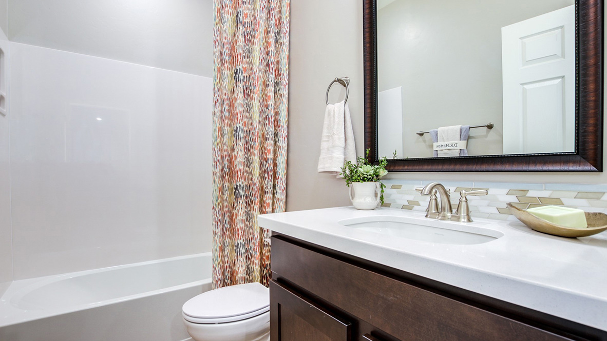 Welcome to The Citrine, a spacious single-story new home located in the Sycamore Vista. With 2,577 square feet of well-planned living space, this home offers four bedrooms, three bathrooms, and a dedicated study, making it ideal for families who value both space and convenience.  As you enter through the inviting covered porch, you’re greeted by a bright and airy entryway that flows into the heart of the home. The expansive great room, dining area, and kitchen are thoughtfully connected, creating an ideal space for entertaining or enjoying time with family. The kitchen features a large island, quartz countertops, and Shaker-style cabinetry. A spacious pantry and modern stainless-steel appliances ensure your kitchen is both functional and stylish.  The Citrine’s layout includes a generously sized primary bedroom, carefully positioned for privacy at the rear of the home. This room features a large walk-in closet and an en-suite bathroom with luxurious super shower. The additional three bedrooms are well-sized and located in separate areas of the home, ensuring privacy and easy access to two more full bathrooms.  One of the highlights of The Citrine is its versatile study, which can be used as a home office, media room, or extra bedroom for guests. The large laundry room, conveniently situated near the bedrooms, adds to the home’s practicality.  The covered patio, accessible from the great room, offers a perfect spot for outdoor living, where you can enjoy Arizona’s beautiful weather throughout the year. Whether you’re hosting a barbecue or simply relaxing, this outdoor space enhances the home’s appeal.  Designed with energy efficiency and modern living in mind, The Citrine includes smart home technology ensuring comfort and sustainability. Large windows throughout the home allow natural light to brighten every corner.  The Citrine combines style, comfort, and practicality, making it a perfect place to call home in one of Vails’s most sought-after communities.