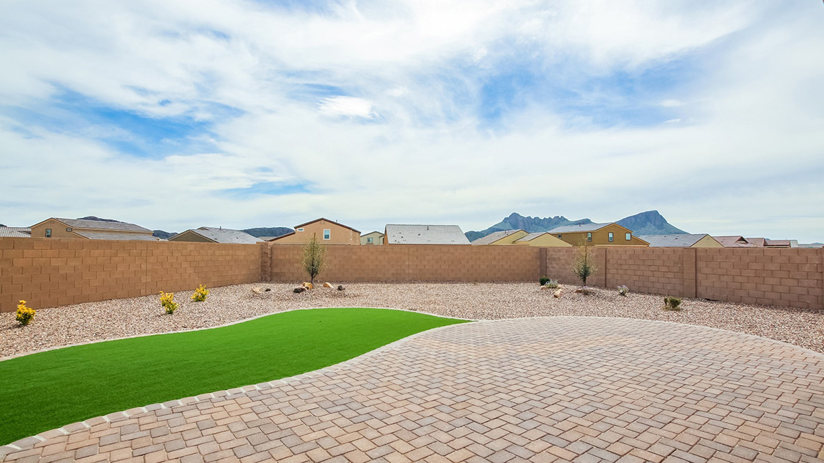 Welcome to The Citrine, a spacious single-story new home located in the Sycamore Vista. With 2,577 square feet of well-planned living space, this home offers four bedrooms, three bathrooms, and a dedicated study, making it ideal for families who value both space and convenience.  As you enter through the inviting covered porch, you’re greeted by a bright and airy entryway that flows into the heart of the home. The expansive great room, dining area, and kitchen are thoughtfully connected, creating an ideal space for entertaining or enjoying time with family. The kitchen features a large island, quartz countertops, and Shaker-style cabinetry. A spacious pantry and modern stainless-steel appliances ensure your kitchen is both functional and stylish.  The Citrine’s layout includes a generously sized primary bedroom, carefully positioned for privacy at the rear of the home. This room features a large walk-in closet and an en-suite bathroom with luxurious super shower. The additional three bedrooms are well-sized and located in separate areas of the home, ensuring privacy and easy access to two more full bathrooms.  One of the highlights of The Citrine is its versatile study, which can be used as a home office, media room, or extra bedroom for guests. The large laundry room, conveniently situated near the bedrooms, adds to the home’s practicality.  The covered patio, accessible from the great room, offers a perfect spot for outdoor living, where you can enjoy Arizona’s beautiful weather throughout the year. Whether you’re hosting a barbecue or simply relaxing, this outdoor space enhances the home’s appeal.  Designed with energy efficiency and modern living in mind, The Citrine includes smart home technology ensuring comfort and sustainability. Large windows throughout the home allow natural light to brighten every corner.  The Citrine combines style, comfort, and practicality, making it a perfect place to call home in one of Vails’s most sought-after communities.