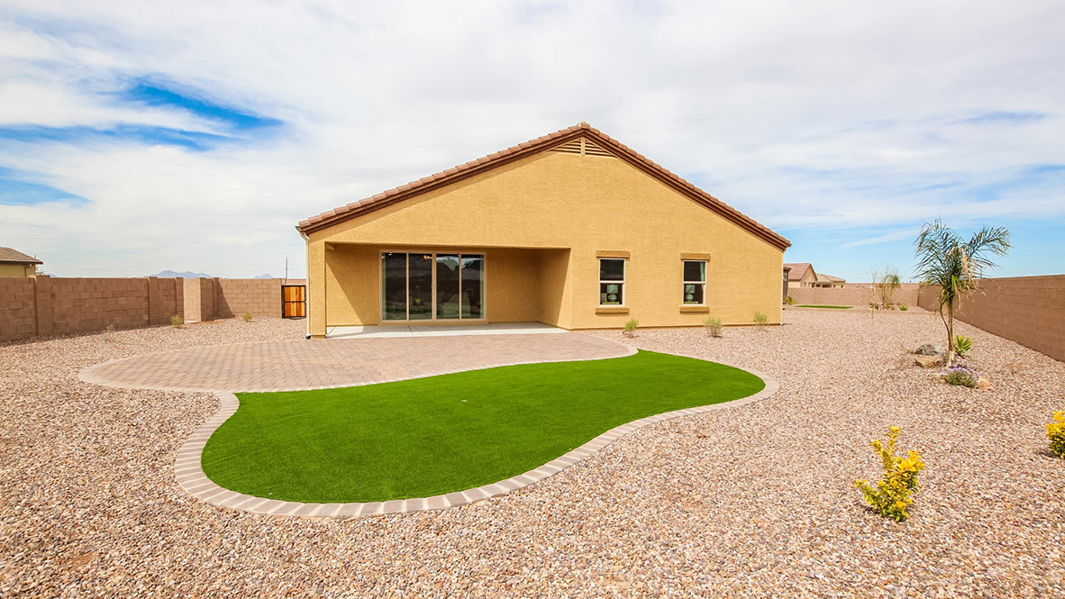 Welcome to The Citrine, a spacious single-story new home located in the Sycamore Vista. With 2,577 square feet of well-planned living space, this home offers four bedrooms, three bathrooms, and a dedicated study, making it ideal for families who value both space and convenience.  As you enter through the inviting covered porch, you’re greeted by a bright and airy entryway that flows into the heart of the home. The expansive great room, dining area, and kitchen are thoughtfully connected, creating an ideal space for entertaining or enjoying time with family. The kitchen features a large island, quartz countertops, and Shaker-style cabinetry. A spacious pantry and modern stainless-steel appliances ensure your kitchen is both functional and stylish.  The Citrine’s layout includes a generously sized primary bedroom, carefully positioned for privacy at the rear of the home. This room features a large walk-in closet and an en-suite bathroom with luxurious super shower. The additional three bedrooms are well-sized and located in separate areas of the home, ensuring privacy and easy access to two more full bathrooms.  One of the highlights of The Citrine is its versatile study, which can be used as a home office, media room, or extra bedroom for guests. The large laundry room, conveniently situated near the bedrooms, adds to the home’s practicality.  The covered patio, accessible from the great room, offers a perfect spot for outdoor living, where you can enjoy Arizona’s beautiful weather throughout the year. Whether you’re hosting a barbecue or simply relaxing, this outdoor space enhances the home’s appeal.  Designed with energy efficiency and modern living in mind, The Citrine includes smart home technology ensuring comfort and sustainability. Large windows throughout the home allow natural light to brighten every corner.  The Citrine combines style, comfort, and practicality, making it a perfect place to call home in one of Vails’s most sought-after communities.