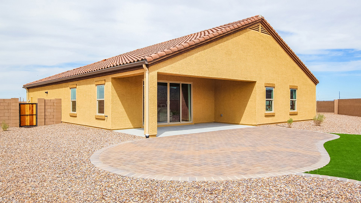 Welcome to The Citrine, a spacious single-story new home located in the Sycamore Vista. With 2,577 square feet of well-planned living space, this home offers four bedrooms, three bathrooms, and a dedicated study, making it ideal for families who value both space and convenience.  As you enter through the inviting covered porch, you’re greeted by a bright and airy entryway that flows into the heart of the home. The expansive great room, dining area, and kitchen are thoughtfully connected, creating an ideal space for entertaining or enjoying time with family. The kitchen features a large island, quartz countertops, and Shaker-style cabinetry. A spacious pantry and modern stainless-steel appliances ensure your kitchen is both functional and stylish.  The Citrine’s layout includes a generously sized primary bedroom, carefully positioned for privacy at the rear of the home. This room features a large walk-in closet and an en-suite bathroom with luxurious super shower. The additional three bedrooms are well-sized and located in separate areas of the home, ensuring privacy and easy access to two more full bathrooms.  One of the highlights of The Citrine is its versatile study, which can be used as a home office, media room, or extra bedroom for guests. The large laundry room, conveniently situated near the bedrooms, adds to the home’s practicality.  The covered patio, accessible from the great room, offers a perfect spot for outdoor living, where you can enjoy Arizona’s beautiful weather throughout the year. Whether you’re hosting a barbecue or simply relaxing, this outdoor space enhances the home’s appeal.  Designed with energy efficiency and modern living in mind, The Citrine includes smart home technology ensuring comfort and sustainability. Large windows throughout the home allow natural light to brighten every corner.  The Citrine combines style, comfort, and practicality, making it a perfect place to call home in one of Vails’s most sought-after communities.