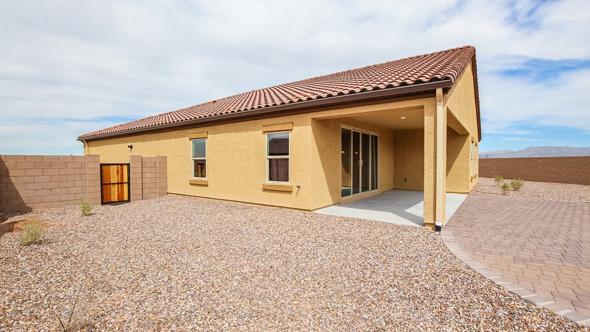 Welcome to The Citrine, a spacious single-story new home located in the Sycamore Vista. With 2,577 square feet of well-planned living space, this home offers four bedrooms, three bathrooms, and a dedicated study, making it ideal for families who value both space and convenience.  As you enter through the inviting covered porch, you’re greeted by a bright and airy entryway that flows into the heart of the home. The expansive great room, dining area, and kitchen are thoughtfully connected, creating an ideal space for entertaining or enjoying time with family. The kitchen features a large island, quartz countertops, and Shaker-style cabinetry. A spacious pantry and modern stainless-steel appliances ensure your kitchen is both functional and stylish.  The Citrine’s layout includes a generously sized primary bedroom, carefully positioned for privacy at the rear of the home. This room features a large walk-in closet and an en-suite bathroom with luxurious super shower. The additional three bedrooms are well-sized and located in separate areas of the home, ensuring privacy and easy access to two more full bathrooms.  One of the highlights of The Citrine is its versatile study, which can be used as a home office, media room, or extra bedroom for guests. The large laundry room, conveniently situated near the bedrooms, adds to the home’s practicality.  The covered patio, accessible from the great room, offers a perfect spot for outdoor living, where you can enjoy Arizona’s beautiful weather throughout the year. Whether you’re hosting a barbecue or simply relaxing, this outdoor space enhances the home’s appeal.  Designed with energy efficiency and modern living in mind, The Citrine includes smart home technology ensuring comfort and sustainability. Large windows throughout the home allow natural light to brighten every corner.  The Citrine combines style, comfort, and practicality, making it a perfect place to call home in one of Vails’s most sought-after communities.