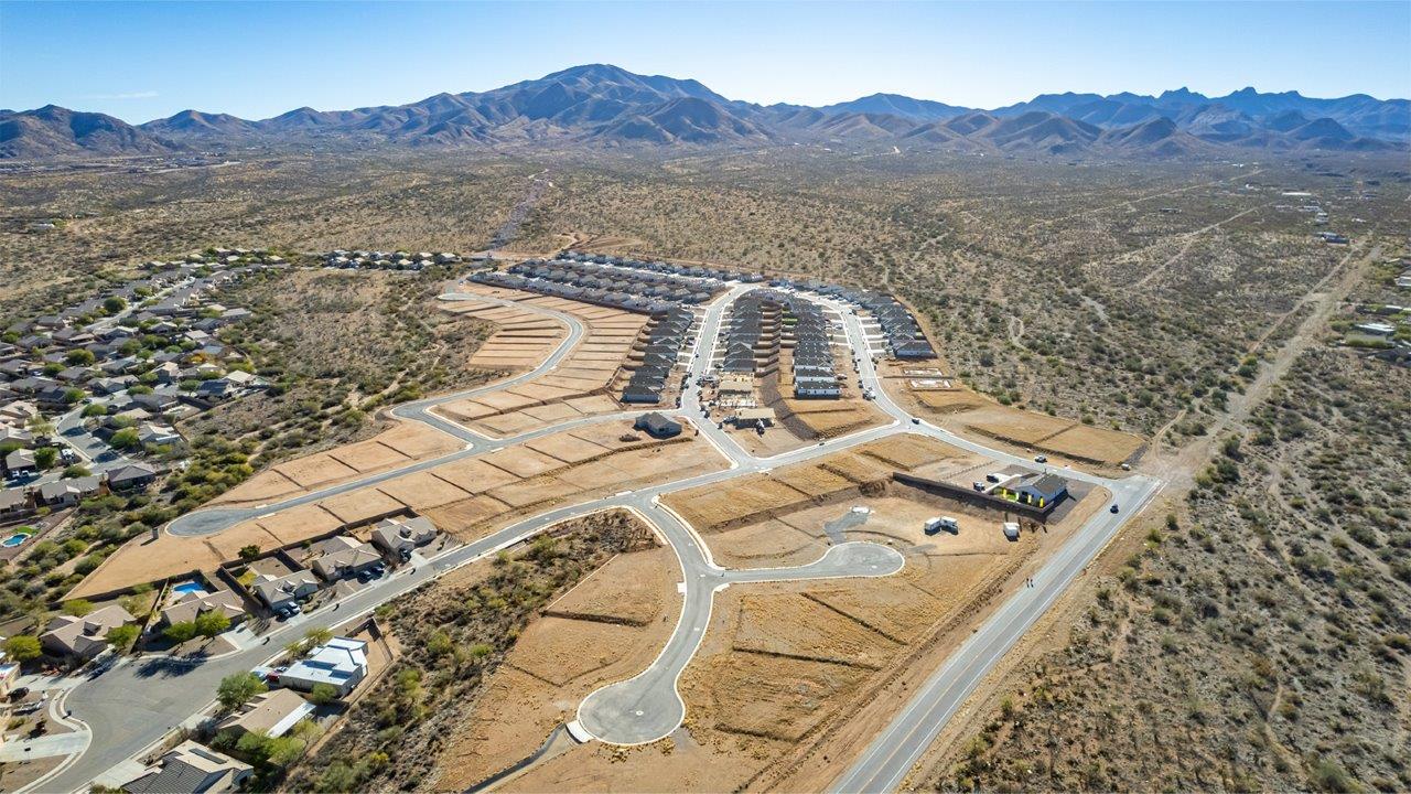 Welcome to The Citrine, a spacious single-story new home located in the Sycamore Vista. With 2,577 square feet of well-planned living space, this home offers four bedrooms, three bathrooms, and a dedicated study, making it ideal for families who value both space and convenience.  As you enter through the inviting covered porch, you’re greeted by a bright and airy entryway that flows into the heart of the home. The expansive great room, dining area, and kitchen are thoughtfully connected, creating an ideal space for entertaining or enjoying time with family. The kitchen features a large island, quartz countertops, and Shaker-style cabinetry. A spacious pantry and modern stainless-steel appliances ensure your kitchen is both functional and stylish.  The Citrine’s layout includes a generously sized primary bedroom, carefully positioned for privacy at the rear of the home. This room features a large walk-in closet and an en-suite bathroom with luxurious super shower. The additional three bedrooms are well-sized and located in separate areas of the home, ensuring privacy and easy access to two more full bathrooms.  One of the highlights of The Citrine is its versatile study, which can be used as a home office, media room, or extra bedroom for guests. The large laundry room, conveniently situated near the bedrooms, adds to the home’s practicality.  The covered patio, accessible from the great room, offers a perfect spot for outdoor living, where you can enjoy Arizona’s beautiful weather throughout the year. Whether you’re hosting a barbecue or simply relaxing, this outdoor space enhances the home’s appeal.  Designed with energy efficiency and modern living in mind, The Citrine includes smart home technology ensuring comfort and sustainability. Large windows throughout the home allow natural light to brighten every corner.  The Citrine combines style, comfort, and practicality, making it a perfect place to call home in one of Vails’s most sought-after communities.