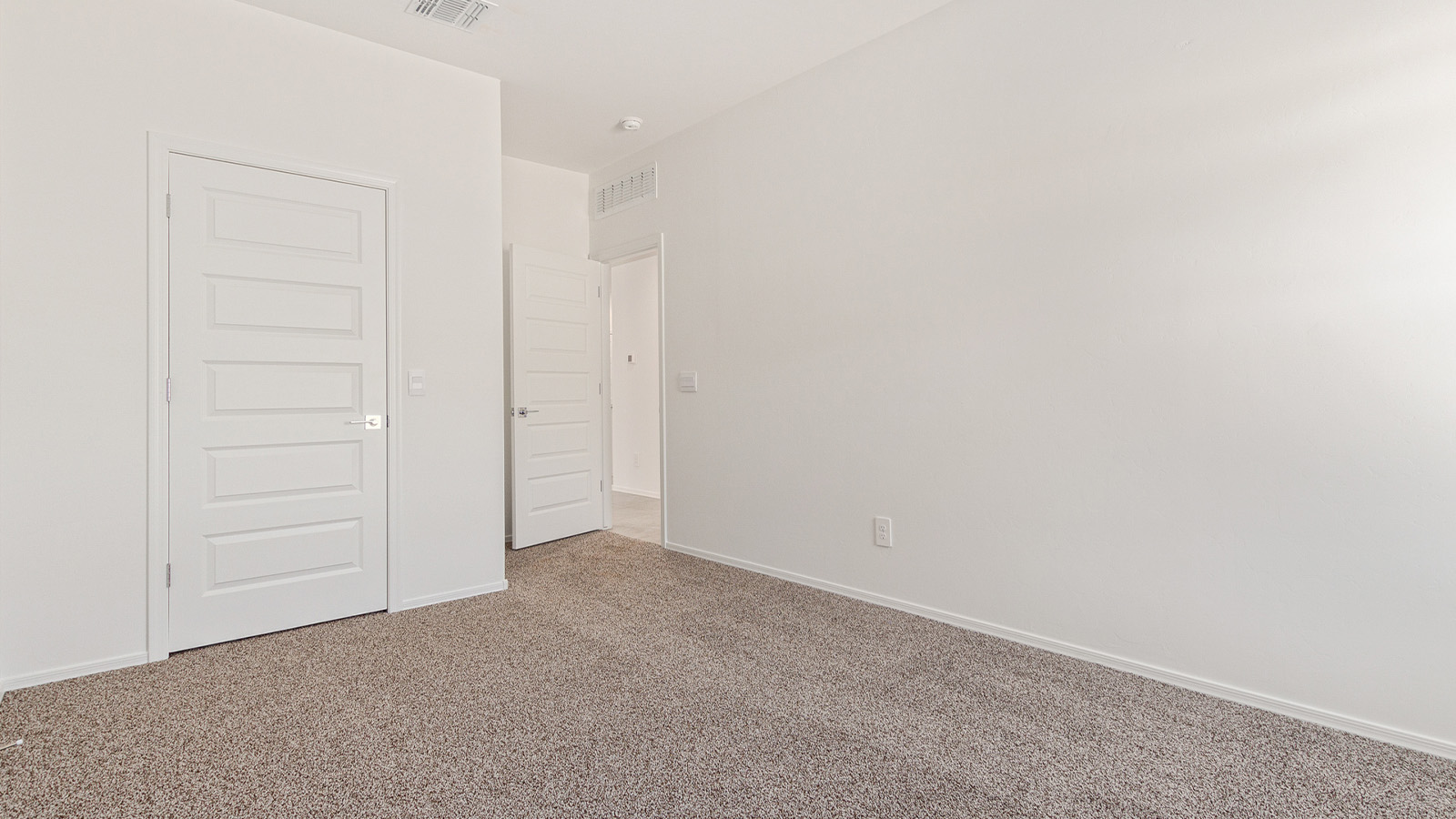 Step into The Elgin, a spacious single-story home located in the scenic Sycamore Vista community in Vail, AZ. This floor plan offers 1,635 square feet of well-planned living space, perfect for those who appreciate both comfort and functionality. With four bedrooms, two bathrooms, and a 3-car garage, The Elgin provides the ideal setting for modern living amidst the beauty of the Santa Rita Mountains.  As you enter through the inviting front porch, you’re welcomed by an open and airy floor plan that flows effortlessly from one room to the next. The heart of the home is the expansive great room, seamlessly connected to the dining area and kitchen, making it ideal for everyday living and entertaining. The kitchen is a chef’s delight, featuring a large island with a breakfast bar, granite countertops, and Shaker-style cabinetry, offering ample storage and workspace. The walk-in pantry and adjacent utility room add convenience and organization to your culinary adventures.  The primary suite is designed with relaxation in mind, offering a spacious bedroom with a walk-in closet and a private en-suite bathroom. This personal haven is positioned at the rear of the home for added privacy. The three additional bedrooms are located towards the front of the home, providing flexibility for guests, family, or a home office setup. A second full bathroom is conveniently situated near these bedrooms.  One of the standout features of The Elgin is the 3-car garage, providing plenty of room for vehicles, storage, or even a workshop. Whether you have multiple cars, recreational vehicles, or just need extra space, this garage has you covered.  Step outside to enjoy your covered patio, which is perfect for outdoor dining, lounging, or simply taking in the stunning Arizona sunsets. The large backyard provides endless possibilities for gardening, play, or creating your own outdoor oasis.  Living at Sycamore Vista means enjoying a community that balances modern amenities with natural beauty. Your home includes luxury finishes such as staggered wood-look ceramic tile flooring throughout most areas, granite countertops, and energy-efficient features like spray foam insulation and tankless water heaters. Additionally, each home in the community comes equipped with a Home is Connected® Smart Home package, offering conveniences like a smart thermostat, video doorbell, keyless entry, a wifi-enabled garage door opener and more.  Sycamore Vista’s prime location in the Vail School District makes it a great choice for families. With schools like Sycamore Elementary and Corona Foothills Middle School nearby, you’ll have peace of mind knowing your children are receiving a quality education. The community’s higher elevation offers cooler summer temperatures and spectacular night skies, making it a perfect spot for stargazing.  Experience the perfect blend of rural charm and modern convenience at Sycamore Vista, where The Elgin offers a space that’s more than just a house—it’s a home designed to grow with you and your family.  *Images shown are for reference only. They depict The Elgin spec home and may not represent the actual home.