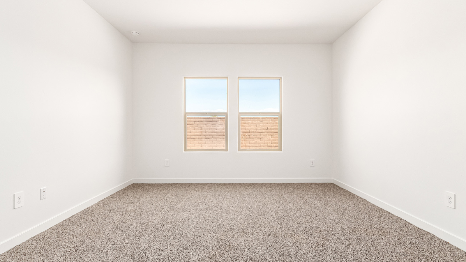 Snuggled within the serene surroundings of Sycamore Vista, The Baxter offers a blend of comfort and convenience. Spanning 1,423 square feet, this thoughtfully crafted single-story home features three bedrooms, two bathrooms, and a two-car garage.  As you step into the welcoming front porch, you’re greeted by a spacious and open floor plan that flows effortlessly into the heart of the home. The great room is designed for both relaxation and socializing, seamlessly connecting to the dining area and kitchen. The kitchen is a culinary enthusiast's dream, featuring quartz countertops, a central island, and Shaker-style cabinetry, all designed to offer ample storage and a style. The adjacent pantry ensures that all your essentials are within easy reach, making meal prep both efficient and enjoyable.  The primary bedroom is located at the rear of the home for enhanced privacy. It includes a spacious walk-in closet and an en-suite bathroom. The two additional bedrooms are thoughtfully positioned near the front of the home, sharing a full bathroom, making it ideal for families or guests.  Outdoor living is a key feature of The Baxter, with a covered patio that extends from the dining area, offering the perfect space to enjoy Tucson’s stunning sunsets or host a weekend barbecue.  Living in Sycamore Vista means you’re part of a community that values both convenience and quality of life. Each home in this community comes with beautifully landscaped front yards, equipped with auto drip irrigation systems. Additionally, Sycamore Vista homes are energy-efficient, featuring DOE Zero Energy Ready standards, including spray foam insulation, tankless water heaters, and LED lighting throughout, ensuring lower energy costs and a reduced environmental footprint.  Experience the best of Arizona living at Sycamore Vista, where The Baxter offers the perfect blend of modern amenities, quality, and craftsmanship.