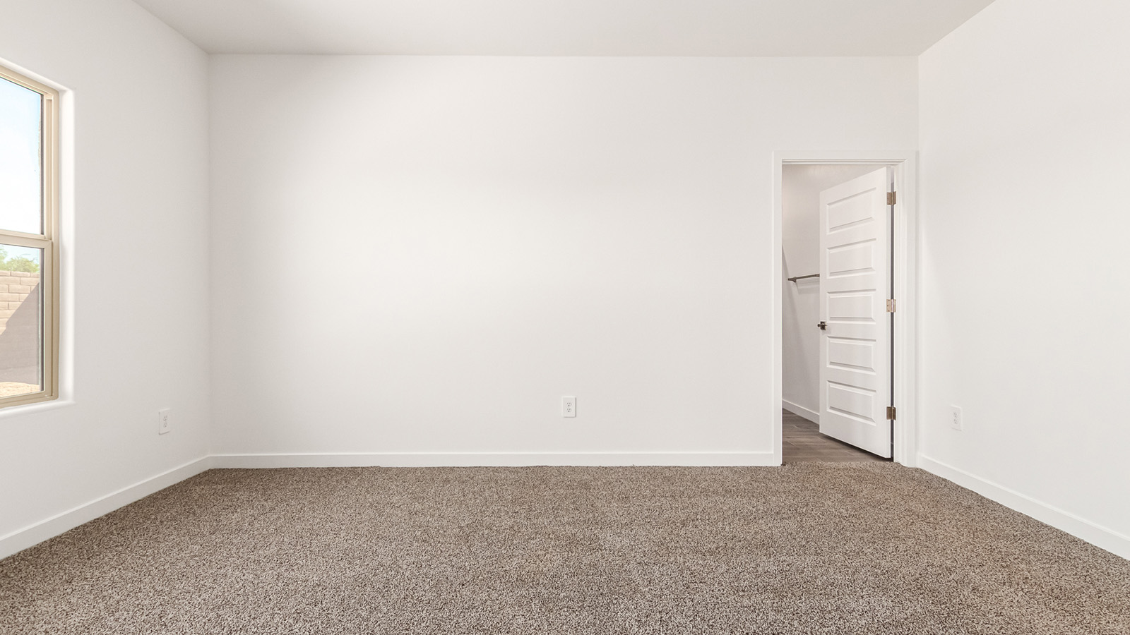 Snuggled within the serene surroundings of Sycamore Vista, The Baxter offers a blend of comfort and convenience, making it a perfect fit for modern living. Spanning 1,423 square feet, this thoughtfully crafted single-story home features three bedrooms, two bathrooms, and a two-car garage, all within the picturesque foothills of the Santa Rita Mountains.  As you step onto the welcoming front porch and enter through the foyer, you’re greeted by a spacious and open floor plan that flows effortlessly into the heart of the home. The great room is designed for both relaxation and socializing, seamlessly connecting to the dining area and kitchen. The kitchen is a culinary enthusiast's dream, featuring sleek quartz countertops, a central island, and Shaker-style cabinetry, all designed to offer ample storage and a stylish backdrop for your cooking adventures. The adjacent pantry ensures that all your essentials are within easy reach, making meal prep both efficient and enjoyable.  The primary bedroom, located at the rear of the home for enhanced privacy, serves as a peaceful retreat. It includes a spacious walk-in closet and an en-suite bathroom equipped with dual vanities and a luxurious shower. The two additional bedrooms are thoughtfully positioned near the front of the home, sharing a full bathroom, making it ideal for families or guests.  Outdoor living is a key feature of The Baxter, with a covered patio that extends from the dining area, offering the perfect space to enjoy Tucson’s stunning sunsets or host a weekend barbecue.  Living in Sycamore Vista means you’re part of a community that values both convenience and quality of life. Each home in this community comes with beautifully landscaped front yards, equipped with auto drip irrigation systems and soft water loops, enhancing the beauty and functionality of your outdoor space. Additionally, Sycamore Vista homes are energy-efficient, featuring DOE Zero Energy Ready standards, including spray foam insulation, tankless water heaters, and LED lighting throughout, ensuring lower energy costs and a reduced environmental footprint.  Experience the best of Arizona living at Sycamore Vista, where The Baxter offers the perfect blend of modern amenities, quality craftsmanship, and the natural beauty of the Santa Rita Mountains, creating a place you’ll be proud to call home.  *Images shown are for reference only. They depict the Baxter model home and may not represent the actual home.