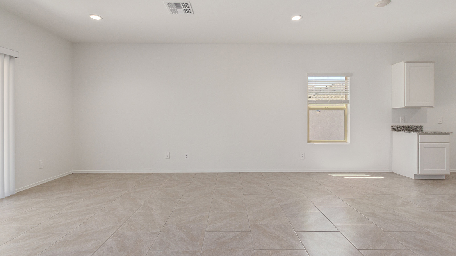 Step into The Elgin, a spacious single-story home located in the scenic Sycamore Vista community in Vail, AZ. This floor plan offers 1,635 square feet of well-planned living space, perfect for those who appreciate both comfort and functionality. With four bedrooms, two bathrooms, and a 3-car garage, The Elgin provides the ideal setting for modern living amidst the beauty of the Santa Rita Mountains.  As you enter through the inviting front porch, you’re welcomed by an open and airy floor plan that flows effortlessly from one room to the next. The heart of the home is the expansive great room, seamlessly connected to the dining area and kitchen, making it ideal for everyday living and entertaining. The kitchen is a chef’s delight, featuring a large island with a breakfast bar, granite countertops, and Shaker-style cabinetry, offering ample storage and workspace. The walk-in pantry and adjacent utility room add convenience and organization to your culinary adventures.  The primary suite is designed with relaxation in mind, offering a spacious bedroom with a walk-in closet and a private en-suite bathroom. This personal haven is positioned at the rear of the home for added privacy. The three additional bedrooms are located towards the front of the home, providing flexibility for guests, family, or a home office setup. A second full bathroom is conveniently situated near these bedrooms.  One of the standout features of The Elgin is the 3-car garage, providing plenty of room for vehicles, storage, or even a workshop. Whether you have multiple cars, recreational vehicles, or just need extra space, this garage has you covered.  Step outside to enjoy your covered patio, which is perfect for outdoor dining, lounging, or simply taking in the stunning Arizona sunsets. The large backyard provides endless possibilities for gardening, play, or creating your own outdoor oasis.  Living at Sycamore Vista means enjoying a community that balances modern amenities with natural beauty. Your home includes luxury finishes such as staggered wood-look ceramic tile flooring throughout most areas, granite countertops, and energy-efficient features like spray foam insulation and tankless water heaters. Additionally, each home in the community comes equipped with a Home is Connected® Smart Home package, offering conveniences like a smart thermostat, video doorbell, keyless entry, a wifi-enabled garage door opener and more.  Sycamore Vista’s prime location in the Vail School District makes it a great choice for families. With schools like Sycamore Elementary and Corona Foothills Middle School nearby, you’ll have peace of mind knowing your children are receiving a quality education. The community’s higher elevation offers cooler summer temperatures and spectacular night skies, making it a perfect spot for stargazing.  Experience the perfect blend of rural charm and modern convenience at Sycamore Vista, where The Elgin offers a space that’s more than just a house—it’s a home designed to grow with you and your family.  *Images shown are for reference only. They depict the Elgin model home and may not represent the actual home.