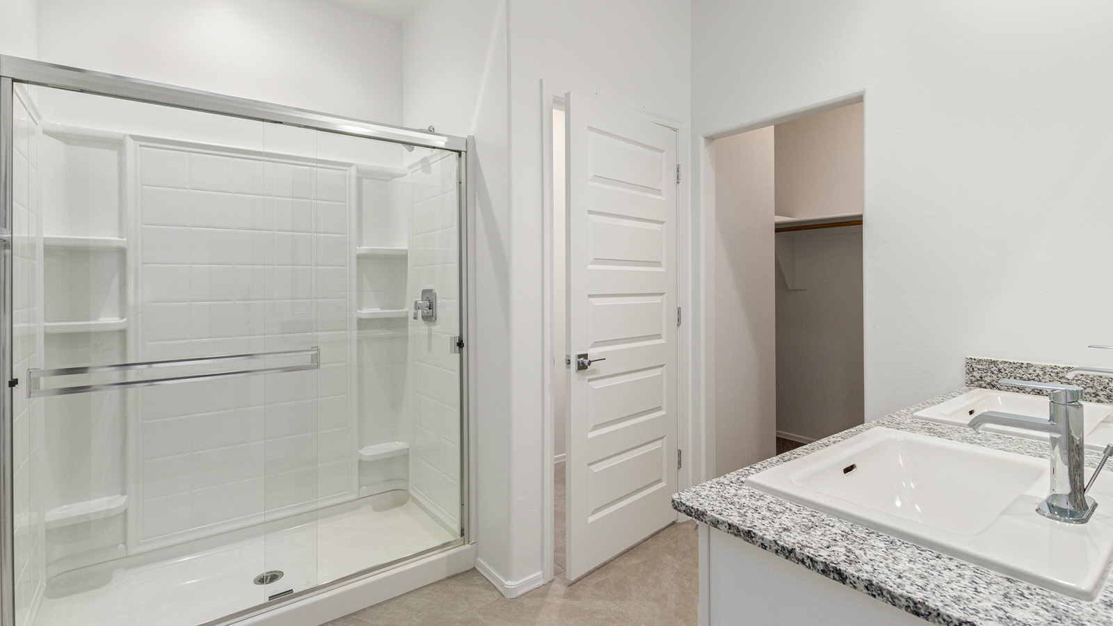 Step into The Elgin, a spacious single-story home located in the scenic Sycamore Vista community in Vail, AZ. This floor plan offers 1,635 square feet of well-planned living space, perfect for those who appreciate both comfort and functionality. With four bedrooms, two bathrooms, and a 3-car garage, The Elgin provides the ideal setting for modern living amidst the beauty of the Santa Rita Mountains.  As you enter through the inviting front porch, you’re welcomed by an open and airy floor plan that flows effortlessly from one room to the next. The heart of the home is the expansive great room, seamlessly connected to the dining area and kitchen, making it ideal for everyday living and entertaining. The kitchen is a chef’s delight, featuring a large island with a breakfast bar, granite countertops, and Shaker-style cabinetry, offering ample storage and workspace. The walk-in pantry and adjacent utility room add convenience and organization to your culinary adventures.  The primary suite is designed with relaxation in mind, offering a spacious bedroom with a walk-in closet and a private en-suite bathroom. This personal haven is positioned at the rear of the home for added privacy. The three additional bedrooms are located towards the front of the home, providing flexibility for guests, family, or a home office setup. A second full bathroom is conveniently situated near these bedrooms.  One of the standout features of The Elgin is the 3-car garage, providing plenty of room for vehicles, storage, or even a workshop. Whether you have multiple cars, recreational vehicles, or just need extra space, this garage has you covered.  Step outside to enjoy your covered patio, which is perfect for outdoor dining, lounging, or simply taking in the stunning Arizona sunsets. The large backyard provides endless possibilities for gardening, play, or creating your own outdoor oasis.  Living at Sycamore Vista means enjoying a community that balances modern amenities with natural beauty. Your home includes luxury finishes such as staggered wood-look ceramic tile flooring throughout most areas, granite countertops, and energy-efficient features like spray foam insulation and tankless water heaters. Additionally, each home in the community comes equipped with a Home is Connected® Smart Home package, offering conveniences like a smart thermostat, video doorbell, keyless entry, a wifi-enabled garage door opener and more.  Sycamore Vista’s prime location in the Vail School District makes it a great choice for families. With schools like Sycamore Elementary and Corona Foothills Middle School nearby, you’ll have peace of mind knowing your children are receiving a quality education. The community’s higher elevation offers cooler summer temperatures and spectacular night skies, making it a perfect spot for stargazing.  Experience the perfect blend of rural charm and modern convenience at Sycamore Vista, where The Elgin offers a space that’s more than just a house—it’s a home designed to grow with you and your family.  *Images shown are for reference only. They depict the Elgin model home and may not represent the actual home.