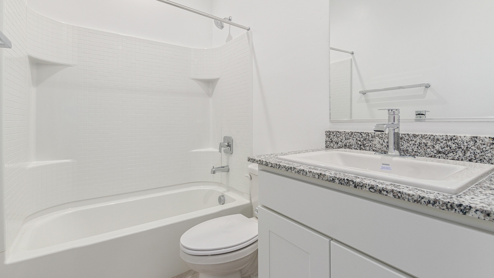 Step into The Elgin, a spacious single-story home located in the scenic Sycamore Vista community in Vail, AZ. This floor plan offers 1,635 square feet of well-planned living space, perfect for those who appreciate both comfort and functionality. With four bedrooms, two bathrooms, and a 3-car garage, The Elgin provides the ideal setting for modern living amidst the beauty of the Santa Rita Mountains.  As you enter through the inviting front porch, you’re welcomed by an open and airy floor plan that flows effortlessly from one room to the next. The heart of the home is the expansive great room, seamlessly connected to the dining area and kitchen, making it ideal for everyday living and entertaining. The kitchen is a chef’s delight, featuring a large island with a breakfast bar, granite countertops, and Shaker-style cabinetry, offering ample storage and workspace. The walk-in pantry and adjacent utility room add convenience and organization to your culinary adventures.  The primary suite is designed with relaxation in mind, offering a spacious bedroom with a walk-in closet and a private en-suite bathroom. This personal haven is positioned at the rear of the home for added privacy. The three additional bedrooms are located towards the front of the home, providing flexibility for guests, family, or a home office setup. A second full bathroom is conveniently situated near these bedrooms.  One of the standout features of The Elgin is the 3-car garage, providing plenty of room for vehicles, storage, or even a workshop. Whether you have multiple cars, recreational vehicles, or just need extra space, this garage has you covered.  Step outside to enjoy your covered patio, which is perfect for outdoor dining, lounging, or simply taking in the stunning Arizona sunsets. The large backyard provides endless possibilities for gardening, play, or creating your own outdoor oasis.  Living at Sycamore Vista means enjoying a community that balances modern amenities with natural beauty. Your home includes luxury finishes such as staggered wood-look ceramic tile flooring throughout most areas, granite countertops, and energy-efficient features like spray foam insulation and tankless water heaters. Additionally, each home in the community comes equipped with a Home is Connected® Smart Home package, offering conveniences like a smart thermostat, video doorbell, keyless entry, a wifi-enabled garage door opener and more.  Sycamore Vista’s prime location in the Vail School District makes it a great choice for families. With schools like Sycamore Elementary and Corona Foothills Middle School nearby, you’ll have peace of mind knowing your children are receiving a quality education. The community’s higher elevation offers cooler summer temperatures and spectacular night skies, making it a perfect spot for stargazing.  Experience the perfect blend of rural charm and modern convenience at Sycamore Vista, where The Elgin offers a space that’s more than just a house—it’s a home designed to grow with you and your family.  *Images shown are for reference only. They depict the Elgin model home and may not represent the actual home.