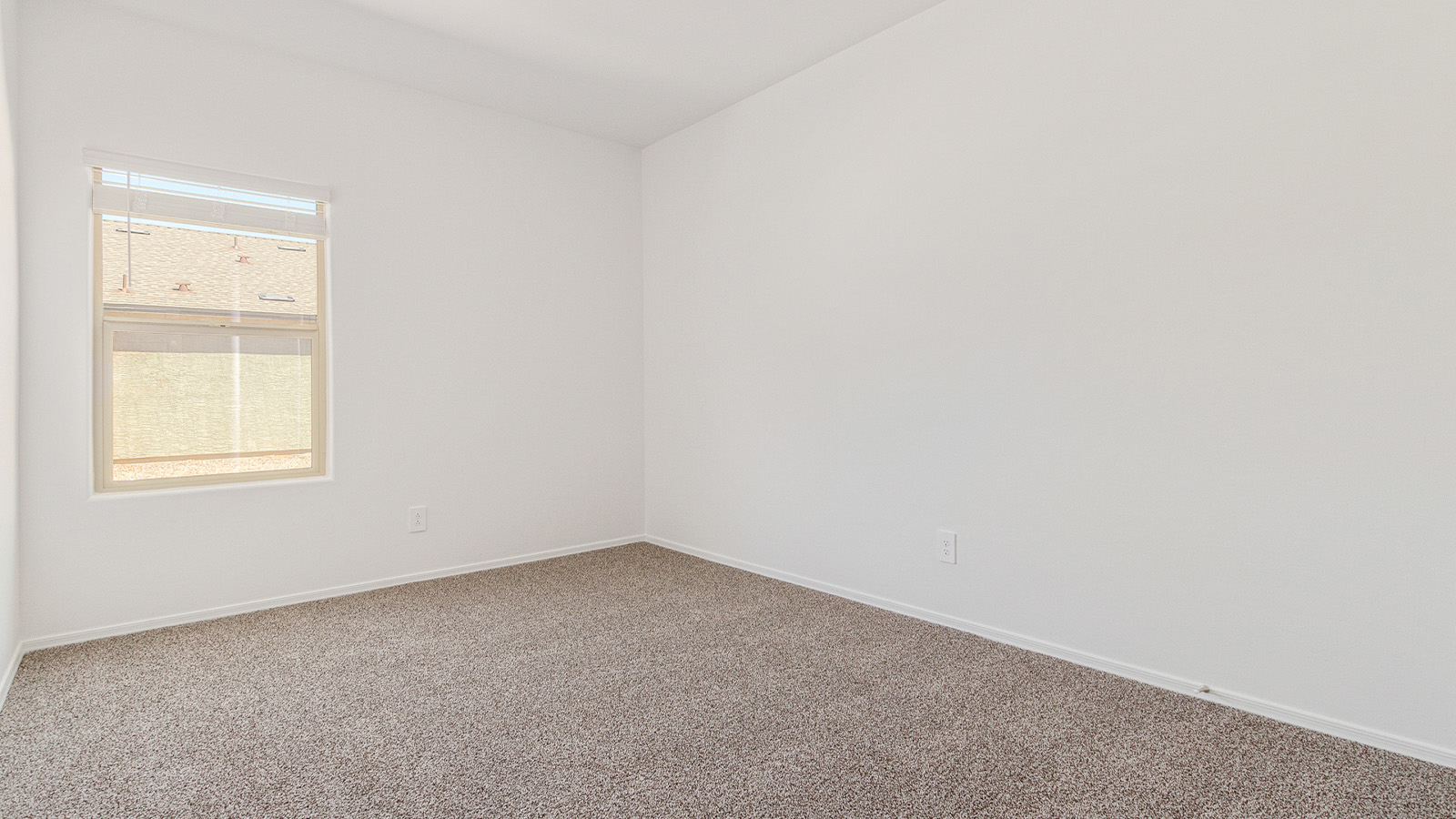 Step into The Elgin, a spacious single-story home located in the scenic Sycamore Vista community in Vail, AZ. This floor plan offers 1,635 square feet of well-planned living space, perfect for those who appreciate both comfort and functionality. With four bedrooms, two bathrooms, and a 3-car garage, The Elgin provides the ideal setting for modern living amidst the beauty of the Santa Rita Mountains.  As you enter through the inviting front porch, you’re welcomed by an open and airy floor plan that flows effortlessly from one room to the next. The heart of the home is the expansive great room, seamlessly connected to the dining area and kitchen, making it ideal for everyday living and entertaining. The kitchen is a chef’s delight, featuring a large island with a breakfast bar, granite countertops, and Shaker-style cabinetry, offering ample storage and workspace. The walk-in pantry and adjacent utility room add convenience and organization to your culinary adventures.  The primary suite is designed with relaxation in mind, offering a spacious bedroom with a walk-in closet and a private en-suite bathroom. This personal haven is positioned at the rear of the home for added privacy. The three additional bedrooms are located towards the front of the home, providing flexibility for guests, family, or a home office setup. A second full bathroom is conveniently situated near these bedrooms.  One of the standout features of The Elgin is the 3-car garage, providing plenty of room for vehicles, storage, or even a workshop. Whether you have multiple cars, recreational vehicles, or just need extra space, this garage has you covered.  Step outside to enjoy your covered patio, which is perfect for outdoor dining, lounging, or simply taking in the stunning Arizona sunsets. The large backyard provides endless possibilities for gardening, play, or creating your own outdoor oasis.  Living at Sycamore Vista means enjoying a community that balances modern amenities with natural beauty. Your home includes luxury finishes such as staggered wood-look ceramic tile flooring throughout most areas, granite countertops, and energy-efficient features like spray foam insulation and tankless water heaters. Additionally, each home in the community comes equipped with a Home is Connected® Smart Home package, offering conveniences like a smart thermostat, video doorbell, keyless entry, a wifi-enabled garage door opener and more.  Sycamore Vista’s prime location in the Vail School District makes it a great choice for families. With schools like Sycamore Elementary and Corona Foothills Middle School nearby, you’ll have peace of mind knowing your children are receiving a quality education. The community’s higher elevation offers cooler summer temperatures and spectacular night skies, making it a perfect spot for stargazing.  Experience the perfect blend of rural charm and modern convenience at Sycamore Vista, where The Elgin offers a space that’s more than just a house—it’s a home designed to grow with you and your family.  *Images shown are for reference only. They depict the Elgin model home and may not represent the actual home.