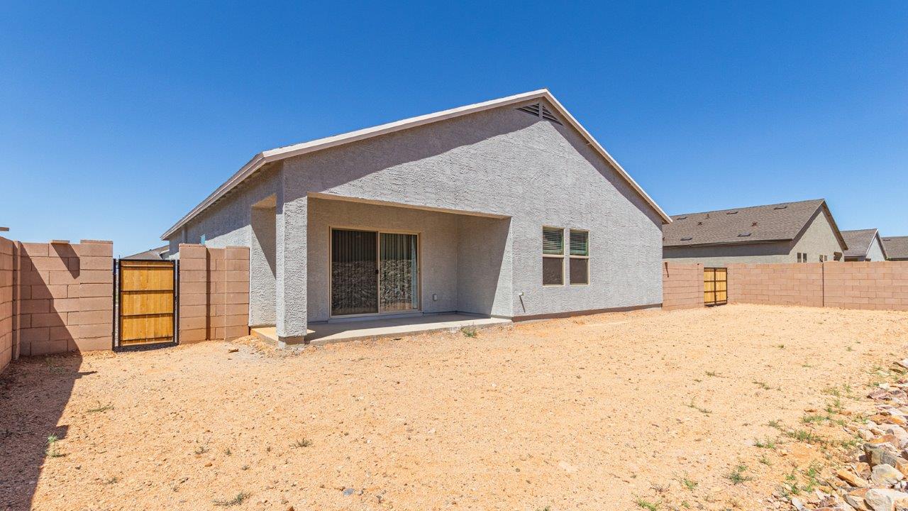 Step into The Elgin, a spacious single-story home located in the scenic Sycamore Vista community in Vail, AZ. This floor plan offers 1,635 square feet of well-planned living space, perfect for those who appreciate both comfort and functionality. With four bedrooms, two bathrooms, and a 3-car garage, The Elgin provides the ideal setting for modern living amidst the beauty of the Santa Rita Mountains.  As you enter through the inviting front porch, you’re welcomed by an open and airy floor plan that flows effortlessly from one room to the next. The heart of the home is the expansive great room, seamlessly connected to the dining area and kitchen, making it ideal for everyday living and entertaining. The kitchen is a chef’s delight, featuring a large island with a breakfast bar, granite countertops, and Shaker-style cabinetry, offering ample storage and workspace. The walk-in pantry and adjacent utility room add convenience and organization to your culinary adventures.  The primary suite is designed with relaxation in mind, offering a spacious bedroom with a walk-in closet and a private en-suite bathroom. This personal haven is positioned at the rear of the home for added privacy. The three additional bedrooms are located towards the front of the home, providing flexibility for guests, family, or a home office setup. A second full bathroom is conveniently situated near these bedrooms.  One of the standout features of The Elgin is the 3-car garage, providing plenty of room for vehicles, storage, or even a workshop. Whether you have multiple cars, recreational vehicles, or just need extra space, this garage has you covered.  Step outside to enjoy your covered patio, which is perfect for outdoor dining, lounging, or simply taking in the stunning Arizona sunsets. The large backyard provides endless possibilities for gardening, play, or creating your own outdoor oasis.  Living at Sycamore Vista means enjoying a community that balances modern amenities with natural beauty. Your home includes luxury finishes such as staggered wood-look ceramic tile flooring throughout most areas, granite countertops, and energy-efficient features like spray foam insulation and tankless water heaters. Additionally, each home in the community comes equipped with a Home is Connected® Smart Home package, offering conveniences like a smart thermostat, video doorbell, keyless entry, a wifi-enabled garage door opener and more.  Sycamore Vista’s prime location in the Vail School District makes it a great choice for families. With schools like Sycamore Elementary and Corona Foothills Middle School nearby, you’ll have peace of mind knowing your children are receiving a quality education. The community’s higher elevation offers cooler summer temperatures and spectacular night skies, making it a perfect spot for stargazing.  Experience the perfect blend of rural charm and modern convenience at Sycamore Vista, where The Elgin offers a space that’s more than just a house—it’s a home designed to grow with you and your family.  *Images shown are for reference only. They depict the Elgin model home and may not represent the actual home.