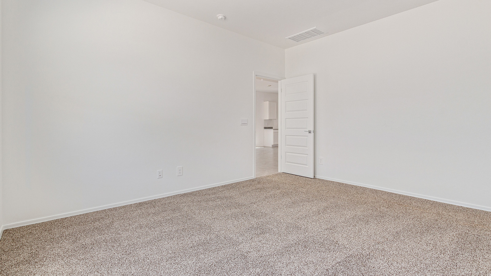 Step into The Elgin, a spacious single-story home located in the scenic Sycamore Vista community in Vail, AZ. This floor plan offers 1,635 square feet of well-planned living space, perfect for those who appreciate both comfort and functionality. With four bedrooms, two bathrooms, and a 3-car garage, The Elgin provides the ideal setting for modern living amidst the beauty of the Santa Rita Mountains.  As you enter through the inviting front porch, you’re welcomed by an open and airy floor plan that flows effortlessly from one room to the next. The heart of the home is the expansive great room, seamlessly connected to the dining area and kitchen, making it ideal for everyday living and entertaining. The kitchen is a chef’s delight, featuring a large island with a breakfast bar, granite countertops, and Shaker-style cabinetry, offering ample storage and workspace. The walk-in pantry and adjacent utility room add convenience and organization to your culinary adventures.  The primary suite is designed with relaxation in mind, offering a spacious bedroom with a walk-in closet and a private en-suite bathroom. This personal haven is positioned at the rear of the home for added privacy. The three additional bedrooms are located towards the front of the home, providing flexibility for guests, family, or a home office setup. A second full bathroom is conveniently situated near these bedrooms.  One of the standout features of The Elgin is the 3-car garage, providing plenty of room for vehicles, storage, or even a workshop. Whether you have multiple cars, recreational vehicles, or just need extra space, this garage has you covered.  Step outside to enjoy your covered patio, which is perfect for outdoor dining, lounging, or simply taking in the stunning Arizona sunsets. The large backyard provides endless possibilities for gardening, play, or creating your own outdoor oasis.  Living at Sycamore Vista means enjoying a community that balances modern amenities with natural beauty. Your home includes luxury finishes such as staggered wood-look ceramic tile flooring throughout most areas, granite countertops, and energy-efficient features like spray foam insulation and tankless water heaters. Additionally, each home in the community comes equipped with a Home is Connected® Smart Home package, offering conveniences like a smart thermostat, video doorbell, keyless entry, a wifi-enabled garage door opener and more.  Sycamore Vista’s prime location in the Vail School District makes it a great choice for families. With schools like Sycamore Elementary and Corona Foothills Middle School nearby, you’ll have peace of mind knowing your children are receiving a quality education. The community’s higher elevation offers cooler summer temperatures and spectacular night skies, making it a perfect spot for stargazing.  Experience the perfect blend of rural charm and modern convenience at Sycamore Vista, where The Elgin offers a space that’s more than just a house—it’s a home designed to grow with you and your family.