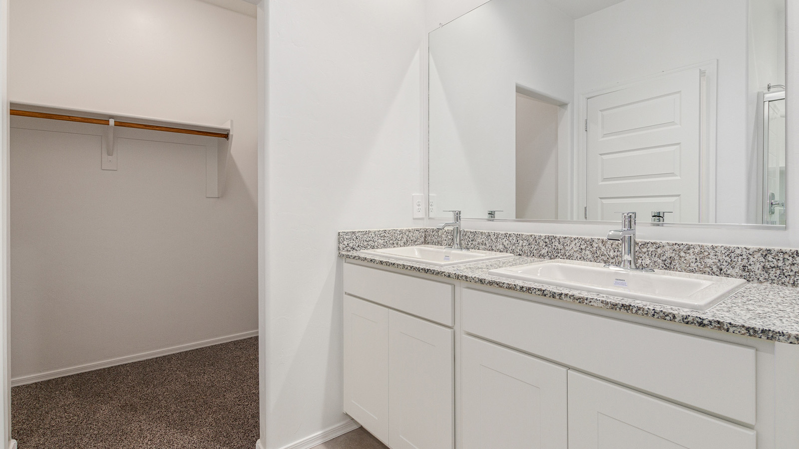 Step into The Elgin, a spacious single-story home located in the scenic Sycamore Vista community in Vail, AZ. This floor plan offers 1,635 square feet of well-planned living space, perfect for those who appreciate both comfort and functionality. With four bedrooms, two bathrooms, and a 3-car garage, The Elgin provides the ideal setting for modern living amidst the beauty of the Santa Rita Mountains.  As you enter through the inviting front porch, you’re welcomed by an open and airy floor plan that flows effortlessly from one room to the next. The heart of the home is the expansive great room, seamlessly connected to the dining area and kitchen, making it ideal for everyday living and entertaining. The kitchen is a chef’s delight, featuring a large island with a breakfast bar, granite countertops, and Shaker-style cabinetry, offering ample storage and workspace. The walk-in pantry and adjacent utility room add convenience and organization to your culinary adventures.  The primary suite is designed with relaxation in mind, offering a spacious bedroom with a walk-in closet and a private en-suite bathroom. This personal haven is positioned at the rear of the home for added privacy. The three additional bedrooms are located towards the front of the home, providing flexibility for guests, family, or a home office setup. A second full bathroom is conveniently situated near these bedrooms.  One of the standout features of The Elgin is the 3-car garage, providing plenty of room for vehicles, storage, or even a workshop. Whether you have multiple cars, recreational vehicles, or just need extra space, this garage has you covered.  Step outside to enjoy your covered patio, which is perfect for outdoor dining, lounging, or simply taking in the stunning Arizona sunsets. The large backyard provides endless possibilities for gardening, play, or creating your own outdoor oasis.  Living at Sycamore Vista means enjoying a community that balances modern amenities with natural beauty. Your home includes luxury finishes such as staggered wood-look ceramic tile flooring throughout most areas, granite countertops, and energy-efficient features like spray foam insulation and tankless water heaters. Additionally, each home in the community comes equipped with a Home is Connected® Smart Home package, offering conveniences like a smart thermostat, video doorbell, keyless entry, a wifi-enabled garage door opener and more.  Sycamore Vista’s prime location in the Vail School District makes it a great choice for families. With schools like Sycamore Elementary and Corona Foothills Middle School nearby, you’ll have peace of mind knowing your children are receiving a quality education. The community’s higher elevation offers cooler summer temperatures and spectacular night skies, making it a perfect spot for stargazing.  Experience the perfect blend of rural charm and modern convenience at Sycamore Vista, where The Elgin offers a space that’s more than just a house—it’s a home designed to grow with you and your family.