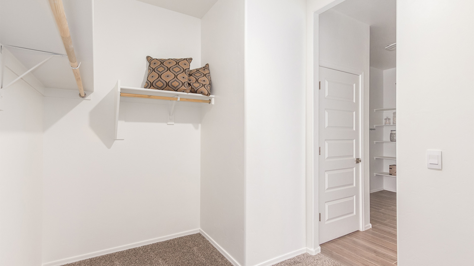 Experience the charm of The Cali, located within the peaceful Sycamore Vista community in the serene foothills of the Santa Rita Mountains, Arizona. This thoughtfully laid-out, single-story home offers 1,823 square feet of versatile living space designed to meet the needs of modern families.  Step into the inviting entryway, where you're welcomed by a spacious great room that serves as the heart of the home. The open-concept design connects the great room to the dining area and kitchen, creating a harmonious flow that's perfect for both entertaining and daily living. The kitchen is a true culinary haven, featuring a large island, quartz countertops, and ample storage space with a walk-in pantry.  The Cali's four bedrooms are designed with relaxation in mind. The primary suite, tucked away from the other bedrooms, offers a private oasis complete with a walk-in closet and en-suite bathroom. The additional three bedrooms share a well-equipped bathroom and are situated to provide comfort and privacy for family members or guests.  Adding to the home's appeal are the premium standard features that come included in every Cali at Sycamore Vista. Enjoy the elegance of staggered wood-look ceramic tile flooring throughout the main living areas, complemented by Shaker-style cabinetry in the kitchen and bathrooms. The kitchen is further enhanced by an open single basin stainless steel sink paired with a water filtration system, making both cooking and cleanup a breeze. The energy-efficient design includes spray foam insulation, a tankless water heater, and LED lighting throughout, all contributing to a more sustainable lifestyle.  Outdoor living is a breeze with the covered patio, easily accessible from the dining room, providing the perfect spot for morning coffee or evening gatherings. The three-car garage offers plenty of space for vehicles and storage, ensuring that everything you need is within easy reach.  Sycamore Vista's location offers a unique blend of tranquility and convenience, making The Cali an ideal choice for those seeking a peaceful retreat with easy access to modern amenities. Whether you're relaxing indoors or enjoying the outdoor beauty of Arizona, The Cali is a home that combines style, comfort, and functionality in every detail.  *Images shown are for reference only. They depict the Cali sales model home and may not represent the actual home.