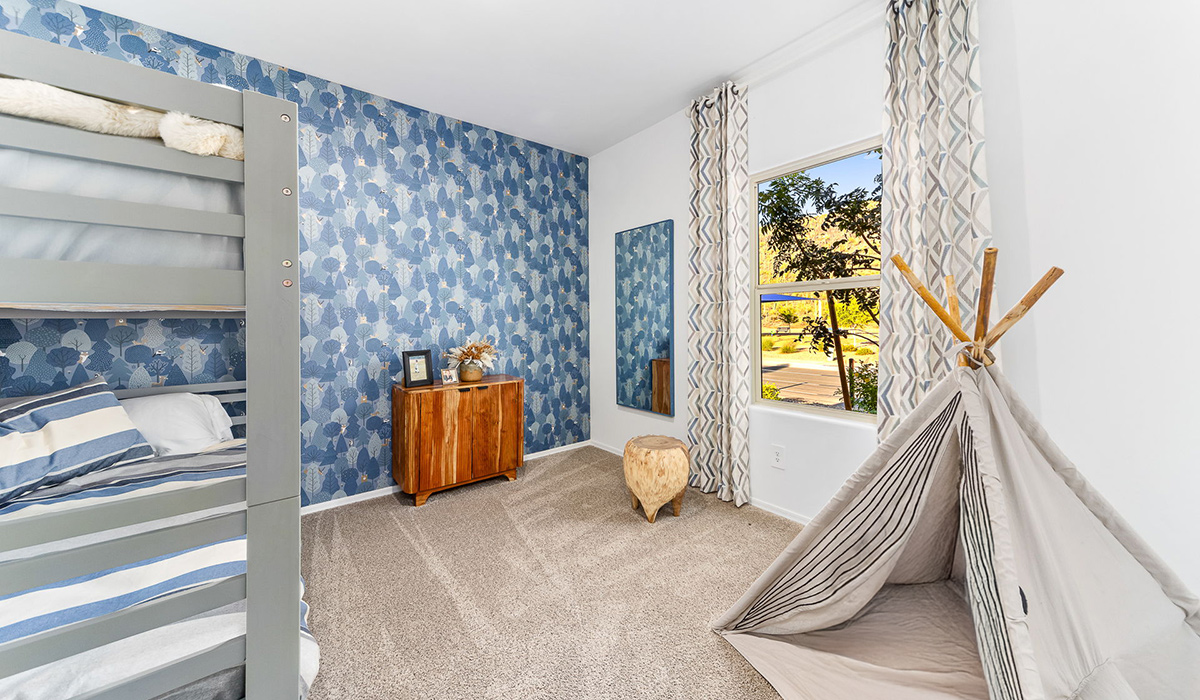 Welcome to the Kingston, a premier new home design situated in the picturesque Sycamore Vista community in Vail, Arizona. With an expansive 2,051 square feet of living space, this single-story home offers four bedrooms, two bathrooms, and a two-car garage.  As you step inside, you are greeted by an inviting entryway that flows seamlessly into a heart of the home. The open-concept kitchen, equipped with a center island, modern appliances, and ample pantry space, makes it ideal for culinary adventures. Adjacent to the kitchen, the dining room offers easy access to the covered patio, where you can enjoy outdoor dining or simply relax in the tranquility of your private backyard.  The Kingston’s thoughtful layout ensures that every bedroom offers comfort and privacy. The primary suite, located at the rear of the home, features a large walk-in closet and an en-suite bathroom. The additional bedrooms are thoughtfully arranged to provide flexibility, whether you need a guest room, home office, or space for hobbies.  The Kingston is built with a focus on energy efficiency, featuring top-of-the-line insulation, energy-efficient appliances, and a smart home package that includes an automated thermostat, keyless entry, a Wi-Fi-enabled garage door opener, and more. This modern home not only offers comfort but also provides peace of mind with its energy-saving features and enhanced security systems.  Residents of Sycamore Vista enjoy a harmonious blend of rural tranquility and convenient urban access. With proximity to outdoor attractions like Coronado National Forest and Colossal Cave Mountain Park, as well as nearby schools and major employers, Sycamore Vista provides a unique living experience where nature and modern living coexist.  The Kingston at Sycamore Vista is more than just a house—it's a place to create lasting memories and live your best life.  *Images shown are for reference only. They depict the sales model home and may not represent the actual home.