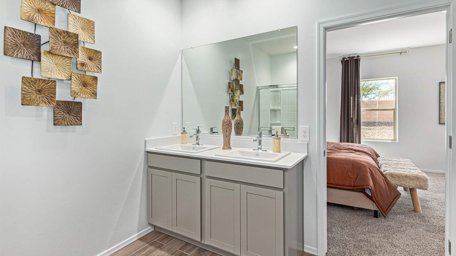 Welcome to the Kingston, a premier new home design situated in the picturesque Sycamore Vista community in Vail, Arizona. With an expansive 2,051 square feet of living space, this single-story home offers four bedrooms, two bathrooms, and a two-three car garage.  As you step inside, you are greeted by an inviting entryway that flows seamlessly into a heart of the home. The open-concept kitchen, equipped with a center island, modern appliances, and ample pantry space, makes it ideal for culinary adventures. Adjacent to the kitchen, the dining room offers easy access to the covered patio, where you can enjoy outdoor dining or simply relax in the tranquility of your private backyard.  The Kingston’s thoughtful layout ensures that every bedroom offers comfort and privacy. The primary suite, located at the rear of the home, features a large walk-in closet and an en-suite bathroom. The additional bedrooms are thoughtfully arranged to provide flexibility, whether you need a guest room, home office, or space for hobbies.  The Kingston is built with a focus on energy efficiency, featuring top-of-the-line insulation, energy-efficient appliances, and a smart home package that includes an automated thermostat, keyless entry, a Wi-Fi-enabled garage door opener, and more. This modern home not only offers comfort but also provides peace of mind with its energy-saving features and enhanced security systems.  Residents of Sycamore Vista enjoy a harmonious blend of rural tranquility and convenient urban access. With proximity to outdoor attractions like Coronado National Forest and Colossal Cave Mountain Park, as well as nearby schools and major employers, Sycamore Vista provides a unique living experience where nature and modern living coexist.  The Kingston at Sycamore Vista is more than just a house—it's a place to create lasting memories and live your best life.  *Images shown are for reference only. They depict the sales model home and may not represent the actual home.