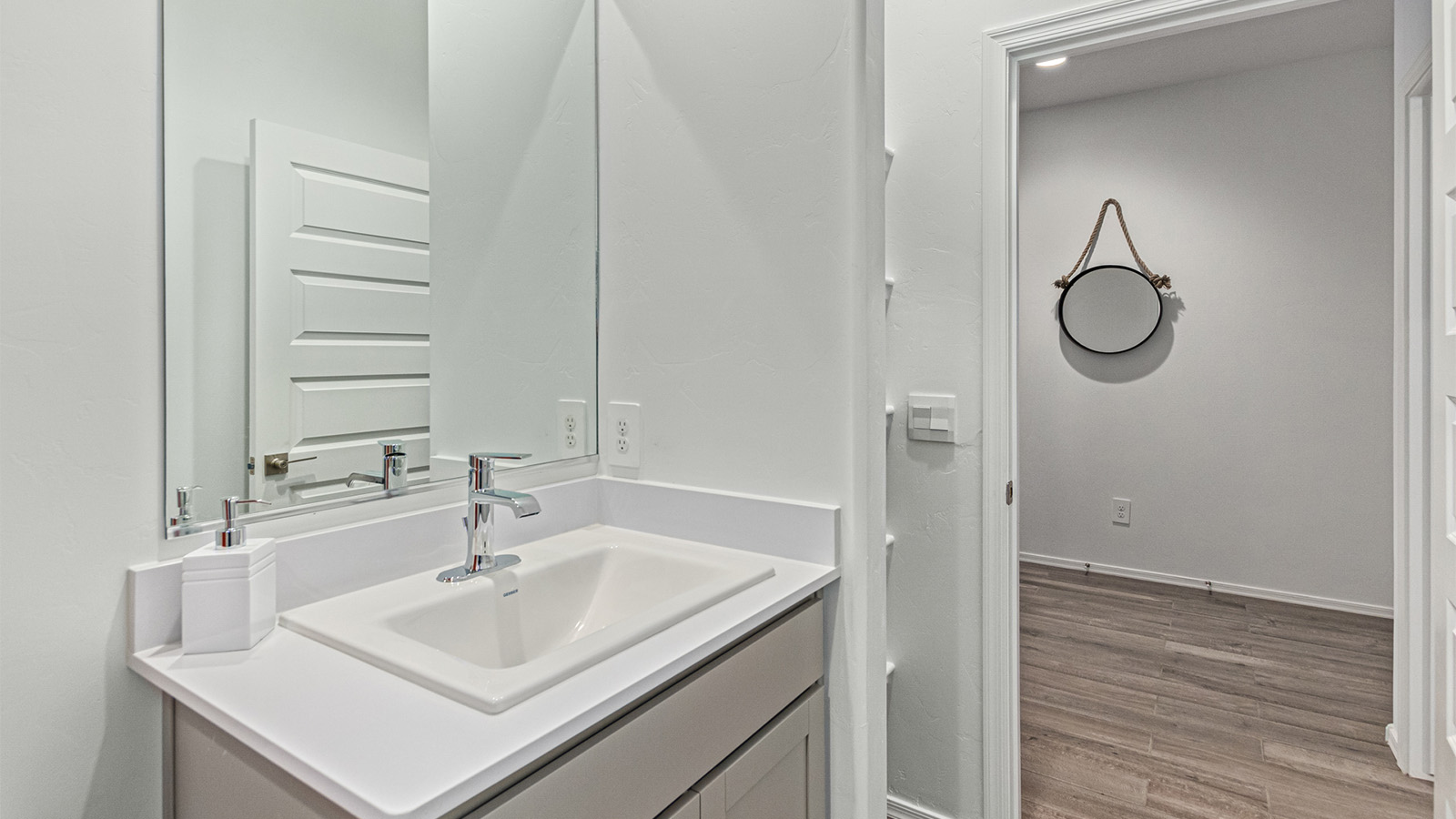 Welcome to the Kingston, a premier new home design situated in the picturesque Sycamore Vista community in Vail, Arizona. With an expansive 2,051 square feet of living space, this single-story home offers four bedrooms, two bathrooms, and a two-three car garage.  As you step inside, you are greeted by an inviting entryway that flows seamlessly into a heart of the home. The open-concept kitchen, equipped with a center island, modern appliances, and ample pantry space, makes it ideal for culinary adventures. Adjacent to the kitchen, the dining room offers easy access to the covered patio, where you can enjoy outdoor dining or simply relax in the tranquility of your private backyard.  The Kingston’s thoughtful layout ensures that every bedroom offers comfort and privacy. The primary suite, located at the rear of the home, features a large walk-in closet and an en-suite bathroom. The additional bedrooms are thoughtfully arranged to provide flexibility, whether you need a guest room, home office, or space for hobbies.  The Kingston is built with a focus on energy efficiency, featuring top-of-the-line insulation, energy-efficient appliances, and a smart home package that includes an automated thermostat, keyless entry, a Wi-Fi-enabled garage door opener, and more. This modern home not only offers comfort but also provides peace of mind with its energy-saving features and enhanced security systems.  Residents of Sycamore Vista enjoy a harmonious blend of rural tranquility and convenient urban access. With proximity to outdoor attractions like Coronado National Forest and Colossal Cave Mountain Park, as well as nearby schools and major employers, Sycamore Vista provides a unique living experience where nature and modern living coexist.  The Kingston at Sycamore Vista is more than just a house—it's a place to create lasting memories and live your best life.  *Images shown are for reference only. They depict the sales model home and may not represent the actual home.