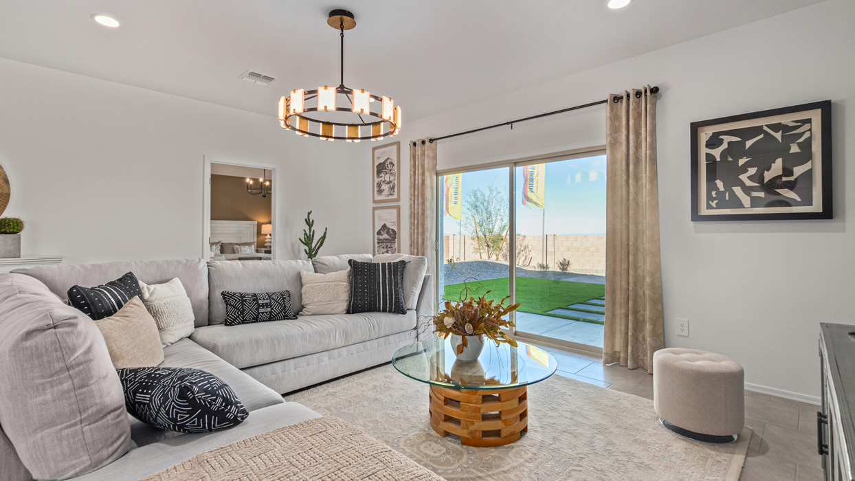 Welcome to the Kingston, a premier new home design situated in the picturesque Sycamore Vista community in Vail, Arizona. With an expansive 2,051 square feet of living space, this single-story home offers four bedrooms, two bathrooms, and a two-three car garage.  As you step inside, you are greeted by an inviting entryway that flows seamlessly into a heart of the home. The open-concept kitchen, equipped with a center island, modern appliances, and ample pantry space, makes it ideal for culinary adventures. Adjacent to the kitchen, the dining room offers easy access to the covered patio, where you can enjoy outdoor dining or simply relax in the tranquility of your private backyard.  The Kingston’s thoughtful layout ensures that every bedroom offers comfort and privacy. The primary suite, located at the rear of the home, features a large walk-in closet and an en-suite bathroom. The additional bedrooms are thoughtfully arranged to provide flexibility, whether you need a guest room, home office, or space for hobbies.  The Kingston is built with a focus on energy efficiency, featuring top-of-the-line insulation, energy-efficient appliances, and a smart home package that includes an automated thermostat, keyless entry, a Wi-Fi-enabled garage door opener, and more. This modern home not only offers comfort but also provides peace of mind with its energy-saving features and enhanced security systems.  Residents of Sycamore Vista enjoy a harmonious blend of rural tranquility and convenient urban access. With proximity to outdoor attractions like Coronado National Forest and Colossal Cave Mountain Park, as well as nearby schools and major employers, Sycamore Vista provides a unique living experience where nature and modern living coexist.  The Kingston at Sycamore Vista is more than just a house—it's a place to create lasting memories and live your best life.  *Images shown are for reference only. They depict the sales model home and may not represent the actual home.