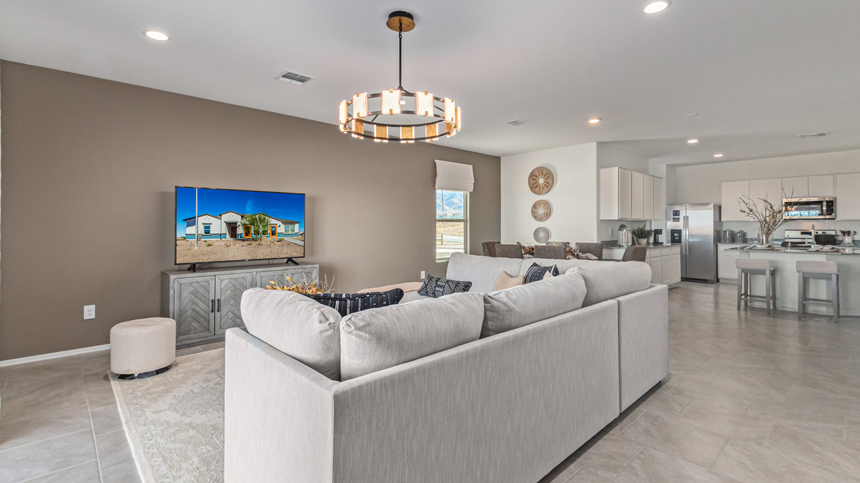 Welcome to the Kingston, a premier new home design situated in the picturesque Sycamore Vista community in Vail, Arizona. With an expansive 2,051 square feet of living space, this single-story home offers four bedrooms, two bathrooms, and a two-three car garage.  As you step inside, you are greeted by an inviting entryway that flows seamlessly into a heart of the home. The open-concept kitchen, equipped with a center island, modern appliances, and ample pantry space, makes it ideal for culinary adventures. Adjacent to the kitchen, the dining room offers easy access to the covered patio, where you can enjoy outdoor dining or simply relax in the tranquility of your private backyard.  The Kingston’s thoughtful layout ensures that every bedroom offers comfort and privacy. The primary suite, located at the rear of the home, features a large walk-in closet and an en-suite bathroom. The additional bedrooms are thoughtfully arranged to provide flexibility, whether you need a guest room, home office, or space for hobbies.  The Kingston is built with a focus on energy efficiency, featuring top-of-the-line insulation, energy-efficient appliances, and a smart home package that includes an automated thermostat, keyless entry, a Wi-Fi-enabled garage door opener, and more. This modern home not only offers comfort but also provides peace of mind with its energy-saving features and enhanced security systems.  Residents of Sycamore Vista enjoy a harmonious blend of rural tranquility and convenient urban access. With proximity to outdoor attractions like Coronado National Forest and Colossal Cave Mountain Park, as well as nearby schools and major employers, Sycamore Vista provides a unique living experience where nature and modern living coexist.  The Kingston at Sycamore Vista is more than just a house—it's a place to create lasting memories and live your best life.  *Images shown are for reference only. They depict the sales model home and may not represent the actual home.