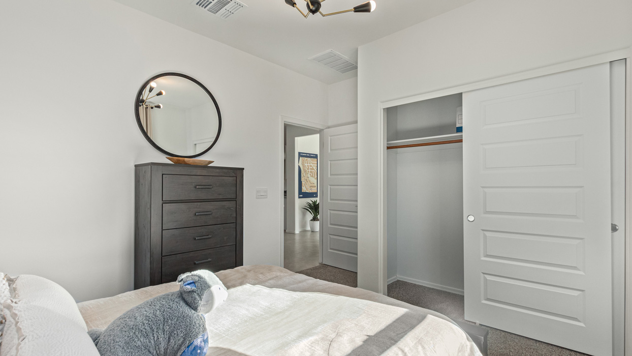 Welcome to the Kingston, a premier new home design situated in the picturesque Sycamore Vista community in Vail, Arizona. With an expansive 2,051 square feet of living space, this single-story home offers four bedrooms, two bathrooms, and a two-three car garage.  As you step inside, you are greeted by an inviting entryway that flows seamlessly into a heart of the home. The open-concept kitchen, equipped with a center island, modern appliances, and ample pantry space, makes it ideal for culinary adventures. Adjacent to the kitchen, the dining room offers easy access to the covered patio, where you can enjoy outdoor dining or simply relax in the tranquility of your private backyard.  The Kingston’s thoughtful layout ensures that every bedroom offers comfort and privacy. The primary suite, located at the rear of the home, features a large walk-in closet and an en-suite bathroom. The additional bedrooms are thoughtfully arranged to provide flexibility, whether you need a guest room, home office, or space for hobbies.  The Kingston is built with a focus on energy efficiency, featuring top-of-the-line insulation, energy-efficient appliances, and a smart home package that includes an automated thermostat, keyless entry, a Wi-Fi-enabled garage door opener, and more. This modern home not only offers comfort but also provides peace of mind with its energy-saving features and enhanced security systems.  Residents of Sycamore Vista enjoy a harmonious blend of rural tranquility and convenient urban access. With proximity to outdoor attractions like Coronado National Forest and Colossal Cave Mountain Park, as well as nearby schools and major employers, Sycamore Vista provides a unique living experience where nature and modern living coexist.  The Kingston at Sycamore Vista is more than just a house—it's a place to create lasting memories and live your best life.  *Images shown are for reference only. They depict the sales model home and may not represent the actual home.