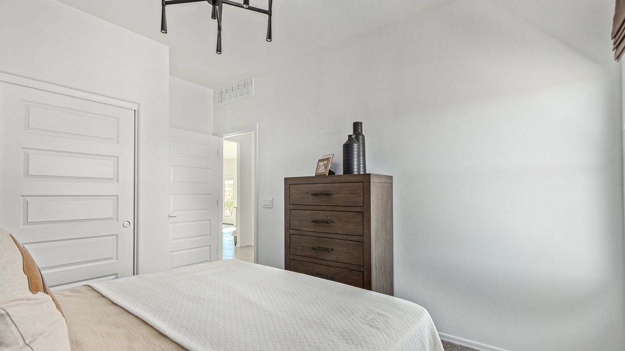 Welcome to the Kingston, a premier new home design situated in the picturesque Sycamore Vista community in Vail, Arizona. With an expansive 2,051 square feet of living space, this single-story home offers four bedrooms, two bathrooms, and a two-three car garage.  As you step inside, you are greeted by an inviting entryway that flows seamlessly into a heart of the home. The open-concept kitchen, equipped with a center island, modern appliances, and ample pantry space, makes it ideal for culinary adventures. Adjacent to the kitchen, the dining room offers easy access to the covered patio, where you can enjoy outdoor dining or simply relax in the tranquility of your private backyard.  The Kingston’s thoughtful layout ensures that every bedroom offers comfort and privacy. The primary suite, located at the rear of the home, features a large walk-in closet and an en-suite bathroom. The additional bedrooms are thoughtfully arranged to provide flexibility, whether you need a guest room, home office, or space for hobbies.  The Kingston is built with a focus on energy efficiency, featuring top-of-the-line insulation, energy-efficient appliances, and a smart home package that includes an automated thermostat, keyless entry, a Wi-Fi-enabled garage door opener, and more. This modern home not only offers comfort but also provides peace of mind with its energy-saving features and enhanced security systems.  Residents of Sycamore Vista enjoy a harmonious blend of rural tranquility and convenient urban access. With proximity to outdoor attractions like Coronado National Forest and Colossal Cave Mountain Park, as well as nearby schools and major employers, Sycamore Vista provides a unique living experience where nature and modern living coexist.  The Kingston at Sycamore Vista is more than just a house—it's a place to create lasting memories and live your best life.  *Images shown are for reference only. They depict the sales model home and may not represent the actual home.