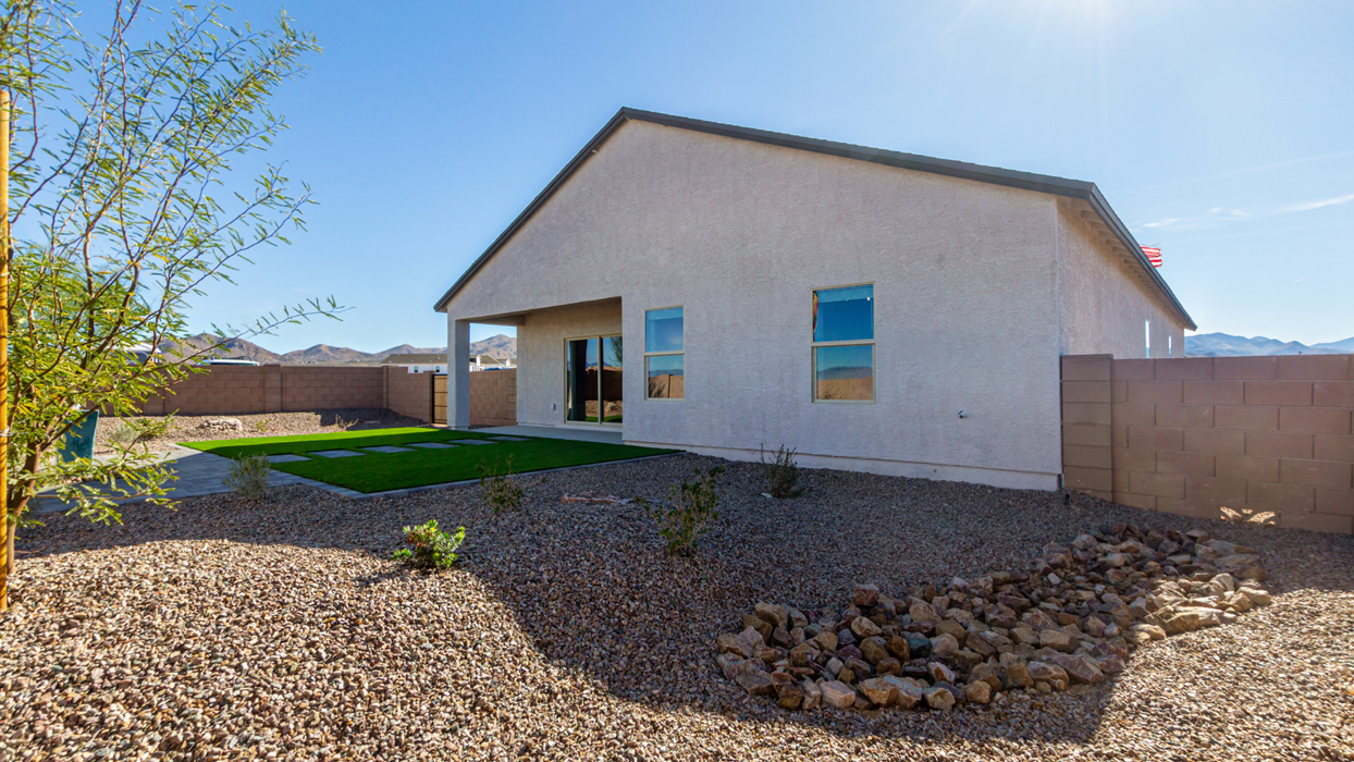 Welcome to the Kingston, a premier new home design situated in the picturesque Sycamore Vista community in Vail, Arizona. With an expansive 2,051 square feet of living space, this single-story home offers four bedrooms, two bathrooms, and a two-three car garage.  As you step inside, you are greeted by an inviting entryway that flows seamlessly into a heart of the home. The open-concept kitchen, equipped with a center island, modern appliances, and ample pantry space, makes it ideal for culinary adventures. Adjacent to the kitchen, the dining room offers easy access to the covered patio, where you can enjoy outdoor dining or simply relax in the tranquility of your private backyard.  The Kingston’s thoughtful layout ensures that every bedroom offers comfort and privacy. The primary suite, located at the rear of the home, features a large walk-in closet and an en-suite bathroom. The additional bedrooms are thoughtfully arranged to provide flexibility, whether you need a guest room, home office, or space for hobbies.  The Kingston is built with a focus on energy efficiency, featuring top-of-the-line insulation, energy-efficient appliances, and a smart home package that includes an automated thermostat, keyless entry, a Wi-Fi-enabled garage door opener, and more. This modern home not only offers comfort but also provides peace of mind with its energy-saving features and enhanced security systems.  Residents of Sycamore Vista enjoy a harmonious blend of rural tranquility and convenient urban access. With proximity to outdoor attractions like Coronado National Forest and Colossal Cave Mountain Park, as well as nearby schools and major employers, Sycamore Vista provides a unique living experience where nature and modern living coexist.  The Kingston at Sycamore Vista is more than just a house—it's a place to create lasting memories and live your best life.  *Images shown are for reference only. They depict the sales model home and may not represent the actual home.