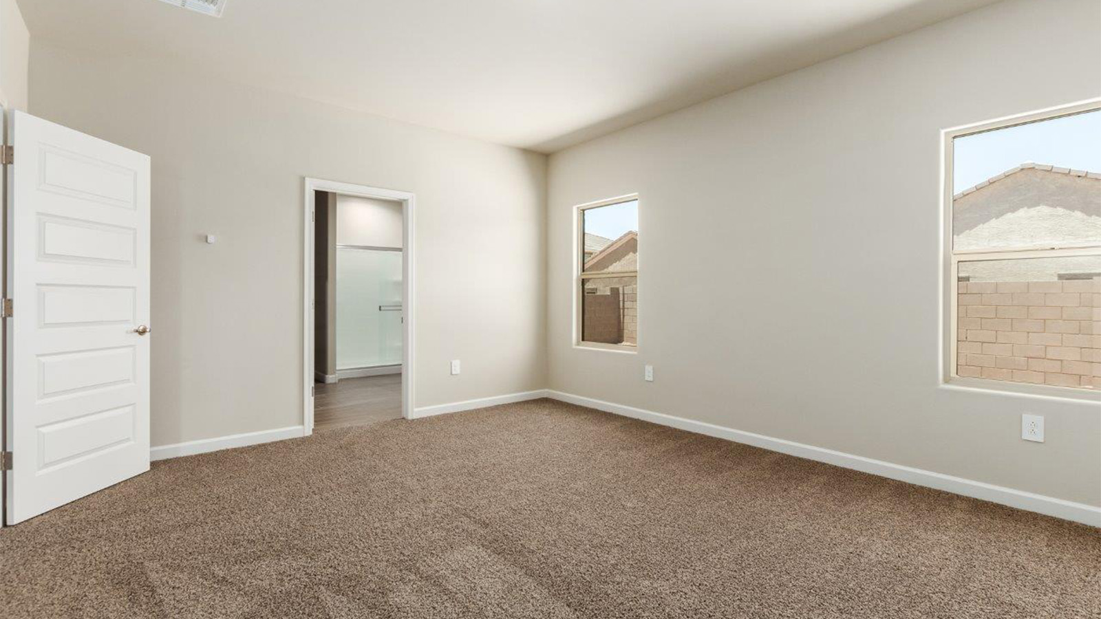 The Lakeway, situated within the beautiful Sycamore Vista community in Vail, Arizona, offers a perfect blend of functionality and comfort, ideal for both growing families and those who appreciate spacious living. With its 2,034 square feet of living space, this single-story new home features five bedrooms and three bathrooms, all meticulously designed to maximize space and convenience.  Entering The Lakeway offers a bright and airy atmosphere that flows through the open-concept floor plan. The heart of the home is the great room, seamlessly connected to the kitchen and dining area. The kitchen is equipped with quartz countertops, Shaker-style cabinetry, and a large island that serves as a focal point for both meal preparation and casual gatherings. The adjoining dining room provides a cozy space for family meals, with easy access to the covered patio through sliding glass doors, creating a wonderful indoor-outdoor living experience.  The primary bedroom is a true retreat, offering a spacious walk-in closet and an en-suite bathroom with a dual-sink vanity and an elegant, tiled shower. The additional bedrooms are thoughtfully spaced to provide ample privacy for family members or guests, and the two secondary bathrooms are finished with modern fixtures and plenty of storage. This home offers a 2-3 car garage option for substantial space of vehicles and storage, accommodating the practical needs of busy households.  Standard features in The Lakeway at Sycamore Vista include energy-efficient elements like a tankless water heater, spray foam insulation, and LED lighting throughout. The home also comes with a Home is Connected® Smart Home package, which includes a smart thermostat, video doorbell, keyless entry, and more, ensuring modern conveniences are at your fingertips. The front yard is beautifully landscaped and includes an auto drip irrigation system, enhancing the curb appeal of this stunning home.  Nestled within Sycamore Vista, The Lakeway combines the tranquility of a rural setting with proximity to excellent schools, shopping, dining, and outdoor recreation, making it an exceptional place to call home.