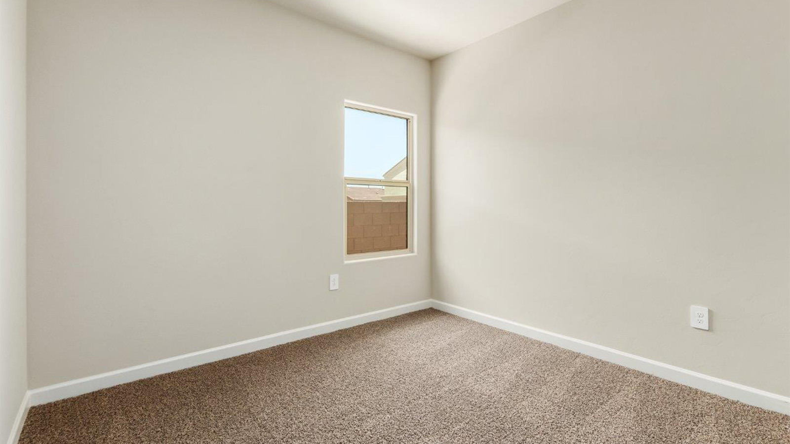 The Lakeway, situated within the beautiful Sycamore Vista community in Vail, Arizona, offers a perfect blend of functionality and comfort, ideal for both growing families and those who appreciate spacious living. With its 2,034 square feet of living space, this single-story new home features five bedrooms and three bathrooms, all meticulously designed to maximize space and convenience.  Entering The Lakeway offers a bright and airy atmosphere that flows through the open-concept floor plan. The heart of the home is the great room, seamlessly connected to the kitchen and dining area. The kitchen is equipped with quartz countertops, Shaker-style cabinetry, and a large island that serves as a focal point for both meal preparation and casual gatherings. The adjoining dining room provides a cozy space for family meals, with easy access to the covered patio through sliding glass doors, creating a wonderful indoor-outdoor living experience.  The primary bedroom is a true retreat, offering a spacious walk-in closet and an en-suite bathroom with a dual-sink vanity and an elegant, tiled shower. The additional bedrooms are thoughtfully spaced to provide ample privacy for family members or guests, and the two secondary bathrooms are finished with modern fixtures and plenty of storage. This home offers a 2-3 car garage option for substantial space of vehicles and storage, accommodating the practical needs of busy households.  Standard features in The Lakeway at Sycamore Vista include energy-efficient elements like a tankless water heater, spray foam insulation, and LED lighting throughout. The home also comes with a Home is Connected® Smart Home package, which includes a smart thermostat, video doorbell, keyless entry, and more, ensuring modern conveniences are at your fingertips. The front yard is beautifully landscaped and includes an auto drip irrigation system, enhancing the curb appeal of this stunning home.  Nestled within Sycamore Vista, The Lakeway combines the tranquility of a rural setting with proximity to excellent schools, shopping, dining, and outdoor recreation, making it an exceptional place to call home.