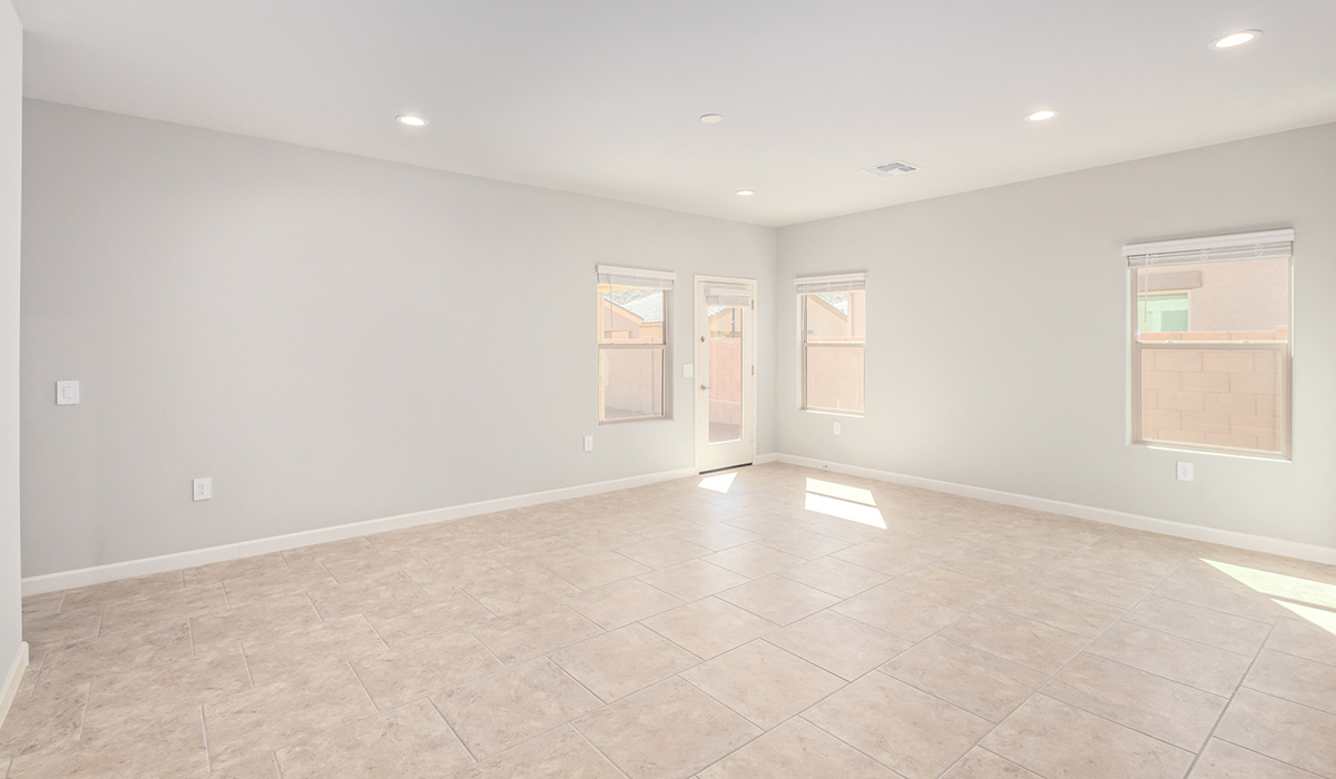 The Lakeway, situated within the beautiful Sycamore Vista community in Vail, Arizona, offers a perfect blend of functionality and comfort, ideal for both growing families and those who appreciate spacious living. With its 2,034 square feet of living space, this single-story new home features five bedrooms and three bathrooms, all meticulously designed to maximize space and convenience.  Entering The Lakeway, you’ll immediately notice the bright and airy atmosphere that flows through the open-concept floor plan. The heart of the home is the great room, seamlessly connected to the kitchen and dining area. The kitchen is equipped with quartz countertops, Shaker-style cabinetry, and a large island that serves as a focal point for both meal preparation and casual gatherings.  The primary bedroom is a true retreat, offering a spacious walk-in closet and an en-suite bathroom. The additional bedrooms are thoughtfully spaced to provide ample privacy for family members or guests, and the two secondary bathrooms are finished with modern fixtures and plenty of storage. This home offers a three-car garage option for substantial space of vehicles and storage, accommodating the practical needs of busy households.  Standard features in The Lakeway at Sycamore Vista include energy-efficient elements like a tankless water heater, spray foam insulation, and LED lighting throughout. The home also comes with a Home is Connected® Smart Home package, which includes a smart thermostat, video doorbell, keyless entry, and more, ensuring modern conveniences are at your fingertips. The front yard is beautifully landscaped and includes an auto drip irrigation system, enhancing the curb appeal of this stunning home.  Nestled within Sycamore Vista, The Lakeway combines the tranquility of a rural setting with proximity to excellent schools, shopping, dining, and outdoor recreation, making it an exceptional place to call home.  *Images shown are for reference only. They depict the model home and may not represent the actual home.