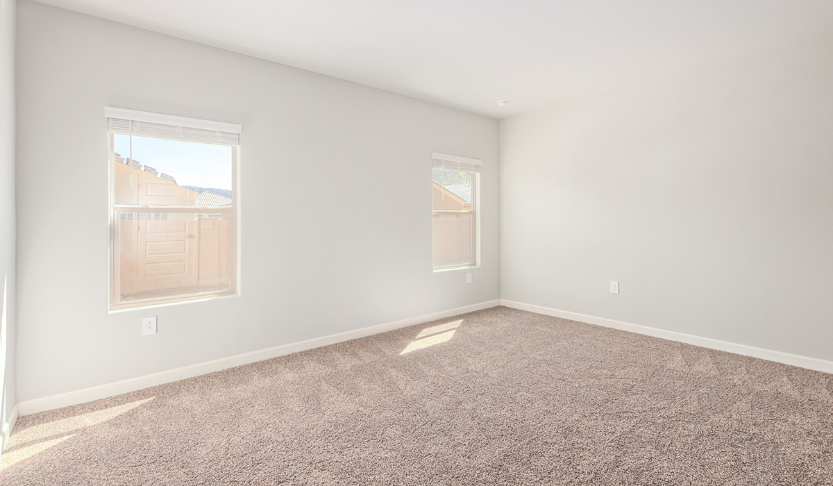 The Lakeway, situated within the beautiful Sycamore Vista community in Vail, Arizona, offers a perfect blend of functionality and comfort, ideal for both growing families and those who appreciate spacious living. With its 2,034 square feet of living space, this single-story new home features five bedrooms and three bathrooms, all meticulously designed to maximize space and convenience.  Entering The Lakeway, you’ll immediately notice the bright and airy atmosphere that flows through the open-concept floor plan. The heart of the home is the great room, seamlessly connected to the kitchen and dining area. The kitchen is equipped with quartz countertops, Shaker-style cabinetry, and a large island that serves as a focal point for both meal preparation and casual gatherings.  The primary bedroom is a true retreat, offering a spacious walk-in closet and an en-suite bathroom. The additional bedrooms are thoughtfully spaced to provide ample privacy for family members or guests, and the two secondary bathrooms are finished with modern fixtures and plenty of storage. This home offers a three-car garage option for substantial space of vehicles and storage, accommodating the practical needs of busy households.  Standard features in The Lakeway at Sycamore Vista include energy-efficient elements like a tankless water heater, spray foam insulation, and LED lighting throughout. The home also comes with a Home is Connected® Smart Home package, which includes a smart thermostat, video doorbell, keyless entry, and more, ensuring modern conveniences are at your fingertips. The front yard is beautifully landscaped and includes an auto drip irrigation system, enhancing the curb appeal of this stunning home.  Nestled within Sycamore Vista, The Lakeway combines the tranquility of a rural setting with proximity to excellent schools, shopping, dining, and outdoor recreation, making it an exceptional place to call home.  *Images shown are for reference only. They depict the model home and may not represent the actual home.