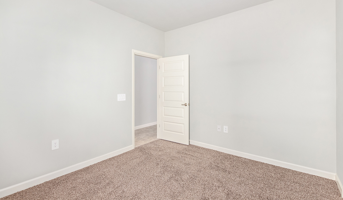 The Lakeway, situated within the beautiful Sycamore Vista community in Vail, Arizona, offers a perfect blend of functionality and comfort, ideal for both growing families and those who appreciate spacious living. With its 2,034 square feet of living space, this single-story new home features five bedrooms and three bathrooms, all meticulously designed to maximize space and convenience.  Entering The Lakeway, you’ll immediately notice the bright and airy atmosphere that flows through the open-concept floor plan. The heart of the home is the great room, seamlessly connected to the kitchen and dining area. The kitchen is equipped with quartz countertops, Shaker-style cabinetry, and a large island that serves as a focal point for both meal preparation and casual gatherings.  The primary bedroom is a true retreat, offering a spacious walk-in closet and an en-suite bathroom. The additional bedrooms are thoughtfully spaced to provide ample privacy for family members or guests, and the two secondary bathrooms are finished with modern fixtures and plenty of storage. This home offers a three-car garage option for substantial space of vehicles and storage, accommodating the practical needs of busy households.  Standard features in The Lakeway at Sycamore Vista include energy-efficient elements like a tankless water heater, spray foam insulation, and LED lighting throughout. The home also comes with a Home is Connected® Smart Home package, which includes a smart thermostat, video doorbell, keyless entry, and more, ensuring modern conveniences are at your fingertips. The front yard is beautifully landscaped and includes an auto drip irrigation system, enhancing the curb appeal of this stunning home.  Nestled within Sycamore Vista, The Lakeway combines the tranquility of a rural setting with proximity to excellent schools, shopping, dining, and outdoor recreation, making it an exceptional place to call home.  *Images shown are for reference only. They depict the model home and may not represent the actual home.