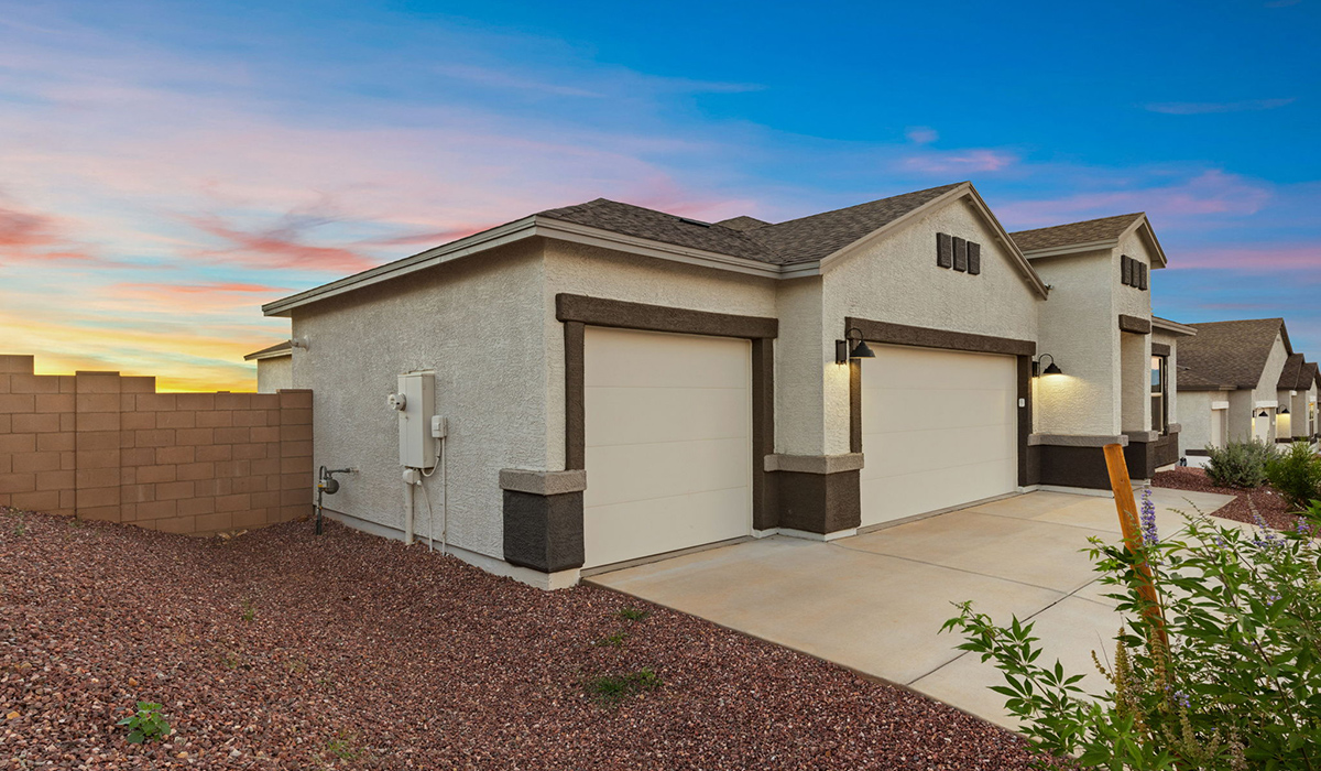 The Lakeway, situated within the beautiful Sycamore Vista community in Vail, Arizona, offers a perfect blend of functionality and comfort, ideal for both growing families and those who appreciate spacious living. With its 2,034 square feet of living space, this single-story new home features five bedrooms and three bathrooms, all meticulously designed to maximize space and convenience.  Entering The Lakeway, you’ll immediately notice the bright and airy atmosphere that flows through the open-concept floor plan. The heart of the home is the great room, seamlessly connected to the kitchen and dining area. The kitchen is equipped with quartz countertops, Shaker-style cabinetry, and a large island that serves as a focal point for both meal preparation and casual gatherings.  The primary bedroom is a true retreat, offering a spacious walk-in closet and an en-suite bathroom. The additional bedrooms are thoughtfully spaced to provide ample privacy for family members or guests, and the two secondary bathrooms are finished with modern fixtures and plenty of storage. This home offers a 2-3 car garage option for substantial space of vehicles and storage, accommodating the practical needs of busy households.  Standard features in The Lakeway at Sycamore Vista include energy-efficient elements like a tankless water heater, spray foam insulation, and LED lighting throughout. The home also comes with a Home is Connected® Smart Home package, which includes a smart thermostat, video doorbell, keyless entry, and more, ensuring modern conveniences are at your fingertips. The front yard is beautifully landscaped and includes an auto drip irrigation system, enhancing the curb appeal of this stunning home.  Nestled within Sycamore Vista, The Lakeway combines the tranquility of a rural setting with proximity to excellent schools, shopping, dining, and outdoor recreation, making it an exceptional place to call home.