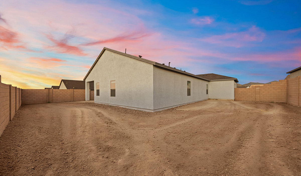 The Lakeway, situated within the beautiful Sycamore Vista community in Vail, Arizona, offers a perfect blend of functionality and comfort, ideal for both growing families and those who appreciate spacious living. With its 2,034 square feet of living space, this single-story new home features five bedrooms and three bathrooms, all meticulously designed to maximize space and convenience.  Entering The Lakeway, you’ll immediately notice the bright and airy atmosphere that flows through the open-concept floor plan. The heart of the home is the great room, seamlessly connected to the kitchen and dining area. The kitchen is equipped with quartz countertops, Shaker-style cabinetry, and a large island that serves as a focal point for both meal preparation and casual gatherings.  The primary bedroom is a true retreat, offering a spacious walk-in closet and an en-suite bathroom. The additional bedrooms are thoughtfully spaced to provide ample privacy for family members or guests, and the two secondary bathrooms are finished with modern fixtures and plenty of storage. This home offers a 2-3 car garage option for substantial space of vehicles and storage, accommodating the practical needs of busy households.  Standard features in The Lakeway at Sycamore Vista include energy-efficient elements like a tankless water heater, spray foam insulation, and LED lighting throughout. The home also comes with a Home is Connected® Smart Home package, which includes a smart thermostat, video doorbell, keyless entry, and more, ensuring modern conveniences are at your fingertips. The front yard is beautifully landscaped and includes an auto drip irrigation system, enhancing the curb appeal of this stunning home.  Nestled within Sycamore Vista, The Lakeway combines the tranquility of a rural setting with proximity to excellent schools, shopping, dining, and outdoor recreation, making it an exceptional place to call home.