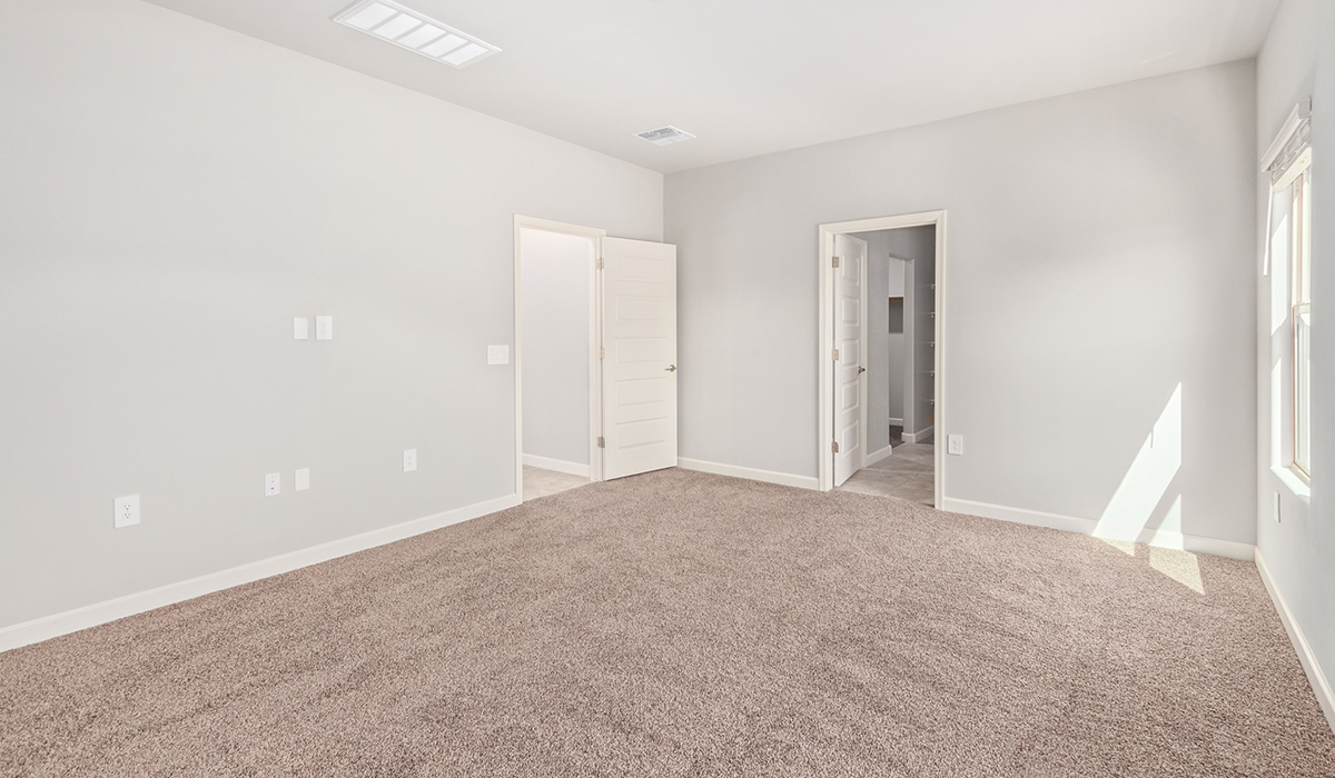 The Lakeway, situated within the beautiful Sycamore Vista community in Vail, Arizona, offers a perfect blend of functionality and comfort, ideal for both growing families and those who appreciate spacious living. With its 2,034 square feet of living space, this single-story new home features five bedrooms and three bathrooms, all meticulously designed to maximize space and convenience.  Entering The Lakeway, you’ll immediately notice the bright and airy atmosphere that flows through the open-concept floor plan. The heart of the home is the great room, seamlessly connected to the kitchen and dining area. The kitchen is equipped with quartz countertops, Shaker-style cabinetry, and a large island that serves as a focal point for both meal preparation and casual gatherings.  The primary bedroom is a true retreat, offering a spacious walk-in closet and an en-suite bathroom. The additional bedrooms are thoughtfully spaced to provide ample privacy for family members or guests, and the two secondary bathrooms are finished with modern fixtures and plenty of storage. This home offers a 2-3 car garage option for substantial space of vehicles and storage, accommodating the practical needs of busy households.  Standard features in The Lakeway at Sycamore Vista include energy-efficient elements like a tankless water heater, spray foam insulation, and LED lighting throughout. The home also comes with a Home is Connected® Smart Home package, which includes a smart thermostat, video doorbell, keyless entry, and more, ensuring modern conveniences are at your fingertips. The front yard is beautifully landscaped and includes an auto drip irrigation system, enhancing the curb appeal of this stunning home.  Nestled within Sycamore Vista, The Lakeway combines the tranquility of a rural setting with proximity to excellent schools, shopping, dining, and outdoor recreation, making it an exceptional place to call home.